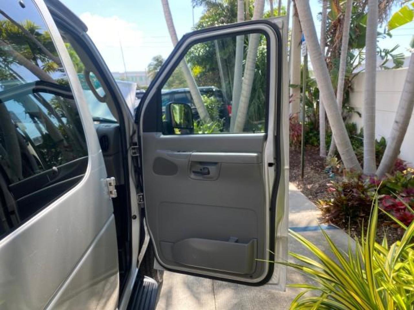 2005 Silver Metallic /Medium Flint Ford Econoline Wagon XLT E350 15 PASS LOW MILES 64,506 (1FBSS31L65H) with an 5.4L EFI V8 Engine engine, Automatic transmission, located at 4701 North Dixie Hwy, Pompano Beach, FL, 33064, (954) 422-2889, 26.240938, -80.123474 - OUR WEBPAGE FLORIDACARS1.COM HAS OVER 100 PHOTOS AND FREE CARFAX LINK 2005 FORD E-SERIES E-350 SD XLT WE HAVE 4 NEW TIRES INCLUDED VIN: 1FBSS31L65HA83248 1 F B S S 3 1 L 6 5 H A 8 3 2 4 8 VAN 5.4L V8 F TOW PKG WE ADDED NEW CLOTH HEADLINER SAGGING FROM AGE GASOLINE REAR WHEEL DRIVE Top Features Cloth - Photo#11