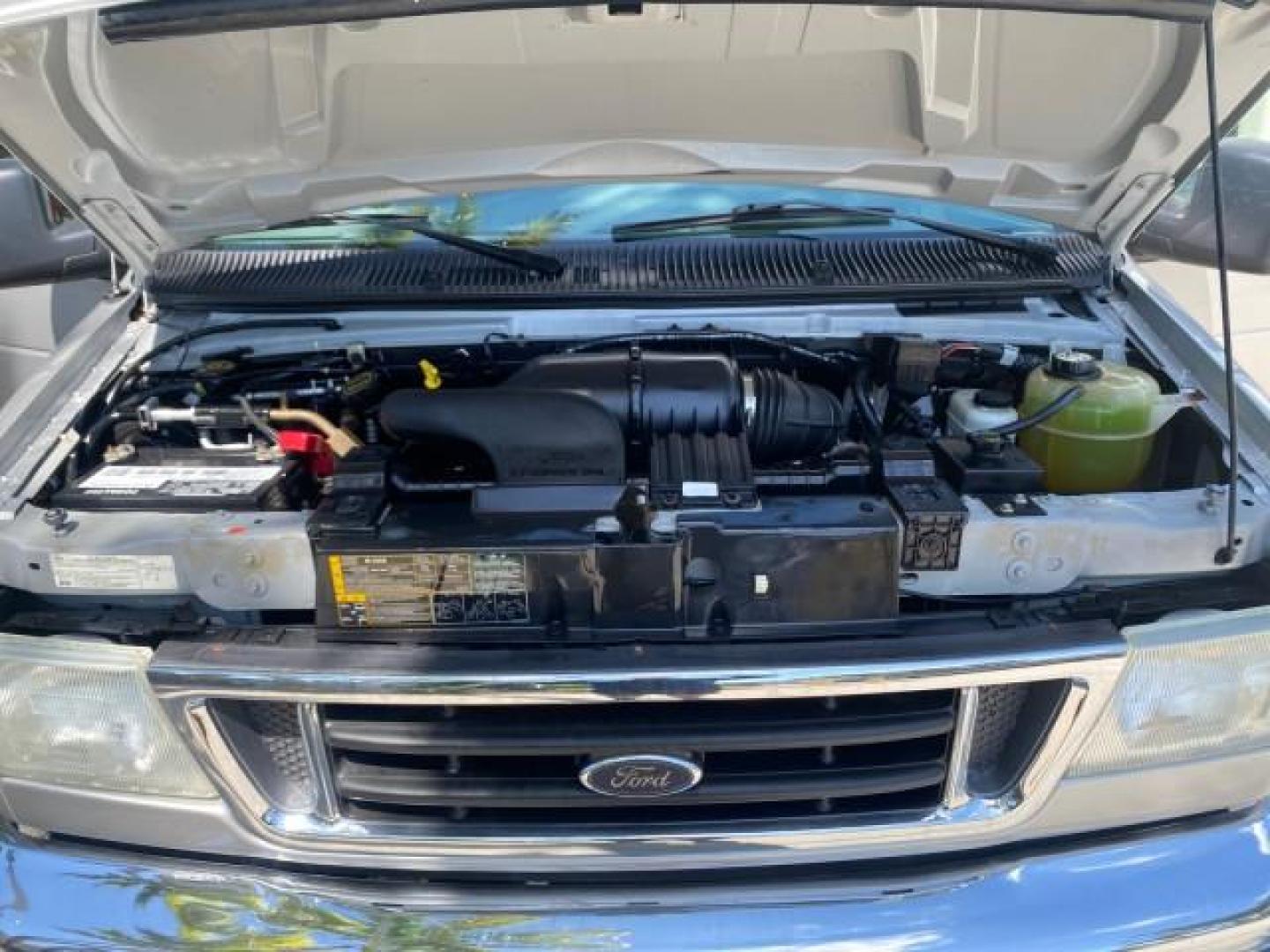 2005 Silver Metallic /Medium Flint Ford Econoline Wagon XLT E350 15 PASS LOW MILES 64,506 (1FBSS31L65H) with an 5.4L EFI V8 Engine engine, Automatic transmission, located at 4701 North Dixie Hwy, Pompano Beach, FL, 33064, (954) 422-2889, 26.240938, -80.123474 - OUR WEBPAGE FLORIDACARS1.COM HAS OVER 100 PHOTOS AND FREE CARFAX LINK 2005 FORD E-SERIES E-350 SD XLT WE HAVE 4 NEW TIRES INCLUDED VIN: 1FBSS31L65HA83248 1 F B S S 3 1 L 6 5 H A 8 3 2 4 8 VAN 5.4L V8 F TOW PKG WE ADDED NEW CLOTH HEADLINER SAGGING FROM AGE GASOLINE REAR WHEEL DRIVE Top Features Cloth - Photo#17
