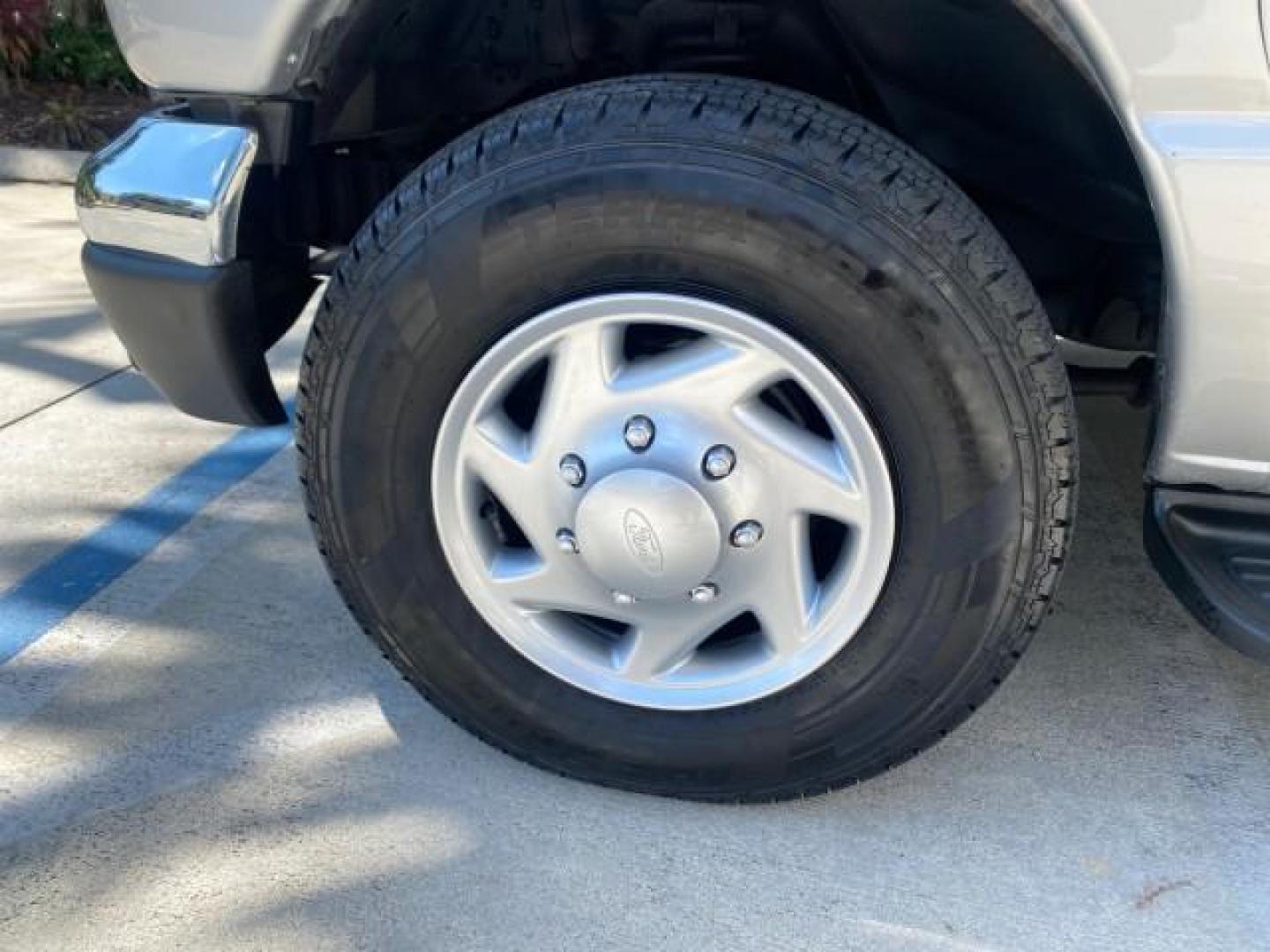2005 Silver Metallic /Medium Flint Ford Econoline Wagon XLT E350 15 PASS LOW MILES 64,506 (1FBSS31L65H) with an 5.4L EFI V8 Engine engine, Automatic transmission, located at 4701 North Dixie Hwy, Pompano Beach, FL, 33064, (954) 422-2889, 26.240938, -80.123474 - OUR WEBPAGE FLORIDACARS1.COM HAS OVER 100 PHOTOS AND FREE CARFAX LINK 2005 FORD E-SERIES E-350 SD XLT WE HAVE 4 NEW TIRES INCLUDED VIN: 1FBSS31L65HA83248 1 F B S S 3 1 L 6 5 H A 8 3 2 4 8 VAN 5.4L V8 F TOW PKG WE ADDED NEW CLOTH HEADLINER SAGGING FROM AGE GASOLINE REAR WHEEL DRIVE Top Features Cloth - Photo#19