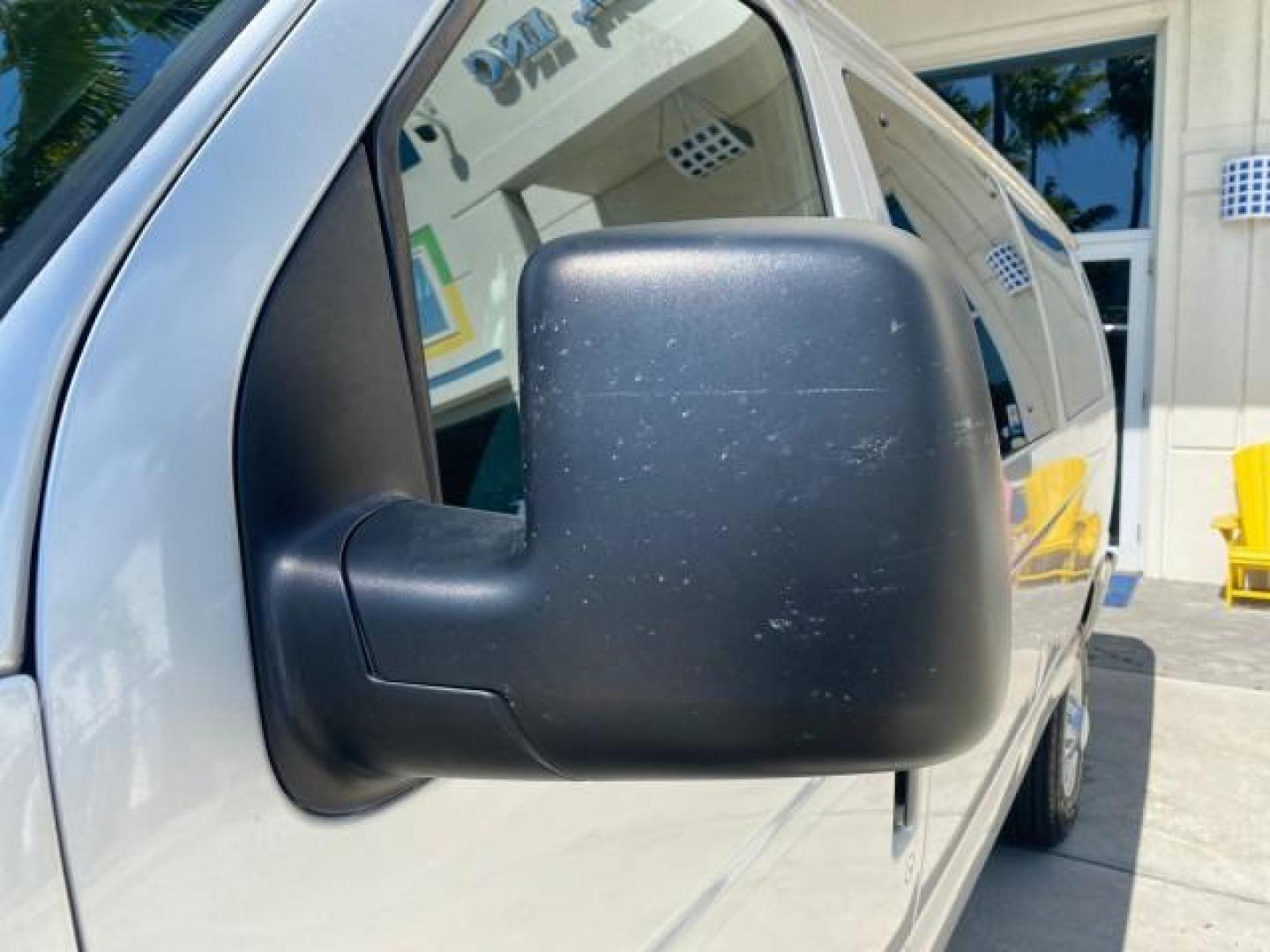 2005 Silver Metallic /Medium Flint Ford Econoline Wagon XLT E350 15 PASS LOW MILES 64,506 (1FBSS31L65H) with an 5.4L EFI V8 Engine engine, Automatic transmission, located at 4701 North Dixie Hwy, Pompano Beach, FL, 33064, (954) 422-2889, 26.240938, -80.123474 - OUR WEBPAGE FLORIDACARS1.COM HAS OVER 100 PHOTOS AND FREE CARFAX LINK 2005 FORD E-SERIES E-350 SD XLT WE HAVE 4 NEW TIRES INCLUDED VIN: 1FBSS31L65HA83248 1 F B S S 3 1 L 6 5 H A 8 3 2 4 8 VAN 5.4L V8 F TOW PKG WE ADDED NEW CLOTH HEADLINER SAGGING FROM AGE GASOLINE REAR WHEEL DRIVE Top Features Cloth - Photo#30