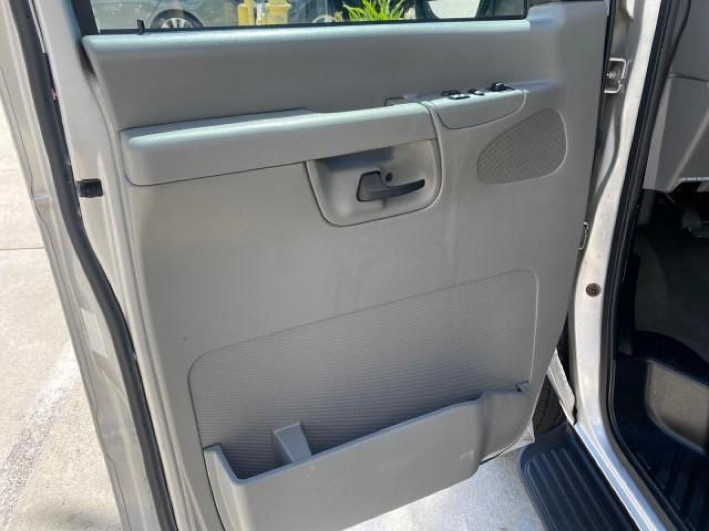 2005 Silver Metallic /Medium Flint Ford Econoline Wagon XLT E350 15 PASS LOW MILES 64,506 (1FBSS31L65H) with an 5.4L EFI V8 Engine engine, Automatic transmission, located at 4701 North Dixie Hwy, Pompano Beach, FL, 33064, (954) 422-2889, 26.240938, -80.123474 - OUR WEBPAGE FLORIDACARS1.COM HAS OVER 100 PHOTOS AND FREE CARFAX LINK 2005 FORD E-SERIES E-350 SD XLT WE HAVE 4 NEW TIRES INCLUDED VIN: 1FBSS31L65HA83248 1 F B S S 3 1 L 6 5 H A 8 3 2 4 8 VAN 5.4L V8 F TOW PKG WE ADDED NEW CLOTH HEADLINER SAGGING FROM AGE GASOLINE REAR WHEEL DRIVE Top Features Cloth - Photo#31