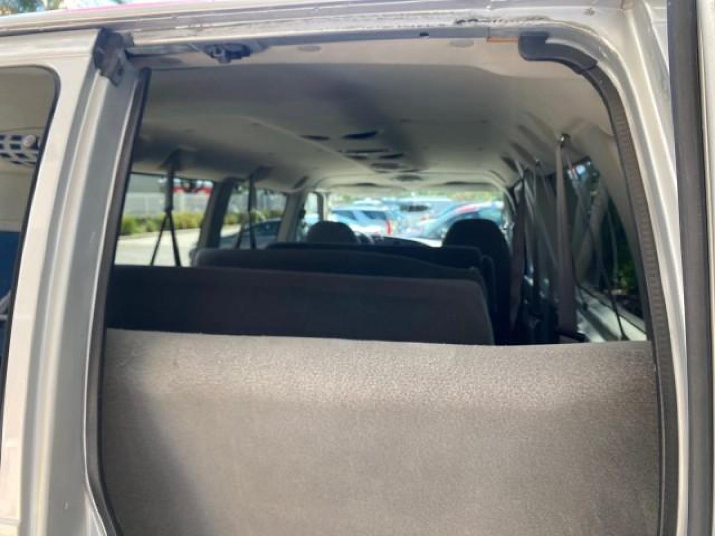2005 Silver Metallic /Medium Flint Ford Econoline Wagon XLT E350 15 PASS LOW MILES 64,506 (1FBSS31L65H) with an 5.4L EFI V8 Engine engine, Automatic transmission, located at 4701 North Dixie Hwy, Pompano Beach, FL, 33064, (954) 422-2889, 26.240938, -80.123474 - OUR WEBPAGE FLORIDACARS1.COM HAS OVER 100 PHOTOS AND FREE CARFAX LINK 2005 FORD E-SERIES E-350 SD XLT WE HAVE 4 NEW TIRES INCLUDED VIN: 1FBSS31L65HA83248 1 F B S S 3 1 L 6 5 H A 8 3 2 4 8 VAN 5.4L V8 F TOW PKG WE ADDED NEW CLOTH HEADLINER SAGGING FROM AGE GASOLINE REAR WHEEL DRIVE Top Features Cloth - Photo#66