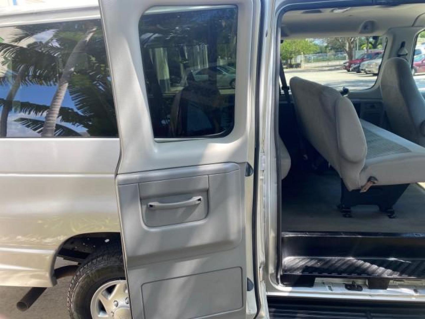 2005 Silver Metallic /Medium Flint Ford Econoline Wagon XLT E350 15 PASS LOW MILES 64,506 (1FBSS31L65H) with an 5.4L EFI V8 Engine engine, Automatic transmission, located at 4701 North Dixie Hwy, Pompano Beach, FL, 33064, (954) 422-2889, 26.240938, -80.123474 - OUR WEBPAGE FLORIDACARS1.COM HAS OVER 100 PHOTOS AND FREE CARFAX LINK 2005 FORD E-SERIES E-350 SD XLT WE HAVE 4 NEW TIRES INCLUDED VIN: 1FBSS31L65HA83248 1 F B S S 3 1 L 6 5 H A 8 3 2 4 8 VAN 5.4L V8 F TOW PKG WE ADDED NEW CLOTH HEADLINER SAGGING FROM AGE GASOLINE REAR WHEEL DRIVE Top Features Cloth - Photo#72