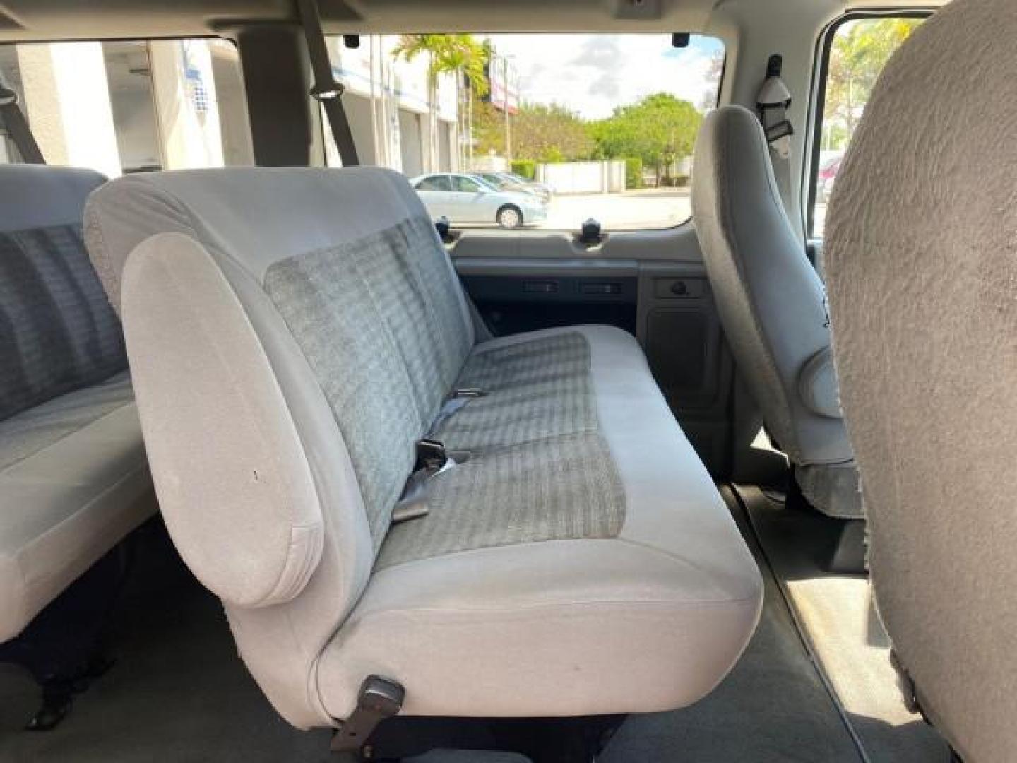 2005 Silver Metallic /Medium Flint Ford Econoline Wagon XLT E350 15 PASS LOW MILES 64,506 (1FBSS31L65H) with an 5.4L EFI V8 Engine engine, Automatic transmission, located at 4701 North Dixie Hwy, Pompano Beach, FL, 33064, (954) 422-2889, 26.240938, -80.123474 - OUR WEBPAGE FLORIDACARS1.COM HAS OVER 100 PHOTOS AND FREE CARFAX LINK 2005 FORD E-SERIES E-350 SD XLT WE HAVE 4 NEW TIRES INCLUDED VIN: 1FBSS31L65HA83248 1 F B S S 3 1 L 6 5 H A 8 3 2 4 8 VAN 5.4L V8 F TOW PKG WE ADDED NEW CLOTH HEADLINER SAGGING FROM AGE GASOLINE REAR WHEEL DRIVE Top Features Cloth - Photo#78