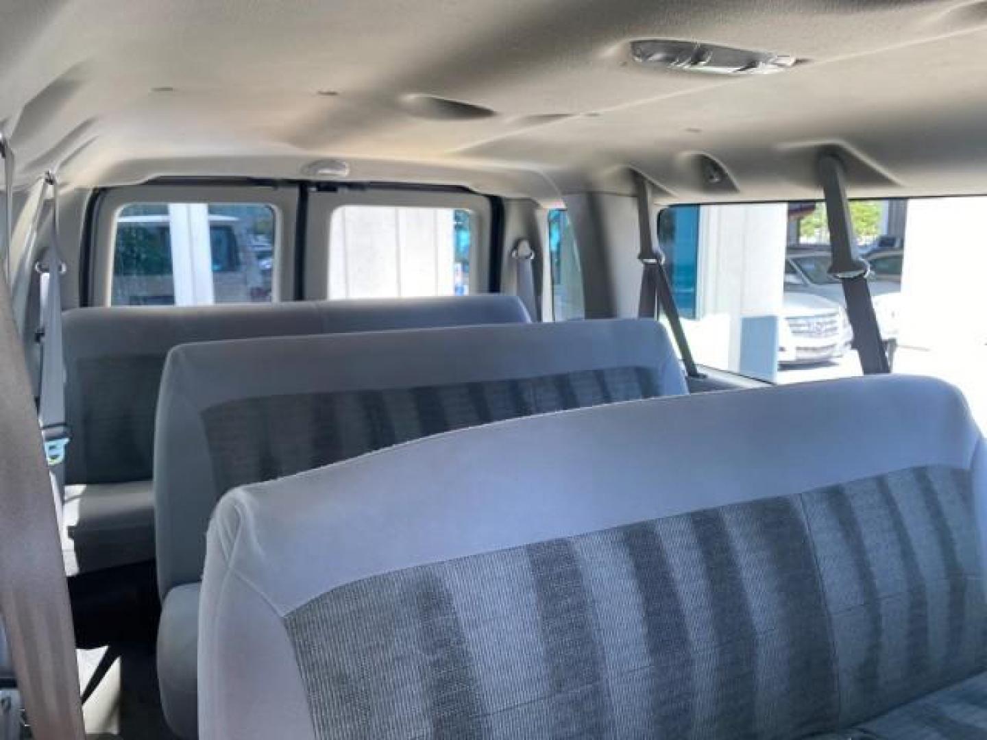 2005 Silver Metallic /Medium Flint Ford Econoline Wagon XLT E350 15 PASS LOW MILES 64,506 (1FBSS31L65H) with an 5.4L EFI V8 Engine engine, Automatic transmission, located at 4701 North Dixie Hwy, Pompano Beach, FL, 33064, (954) 422-2889, 26.240938, -80.123474 - OUR WEBPAGE FLORIDACARS1.COM HAS OVER 100 PHOTOS AND FREE CARFAX LINK 2005 FORD E-SERIES E-350 SD XLT WE HAVE 4 NEW TIRES INCLUDED VIN: 1FBSS31L65HA83248 1 F B S S 3 1 L 6 5 H A 8 3 2 4 8 VAN 5.4L V8 F TOW PKG WE ADDED NEW CLOTH HEADLINER SAGGING FROM AGE GASOLINE REAR WHEEL DRIVE Top Features Cloth - Photo#89