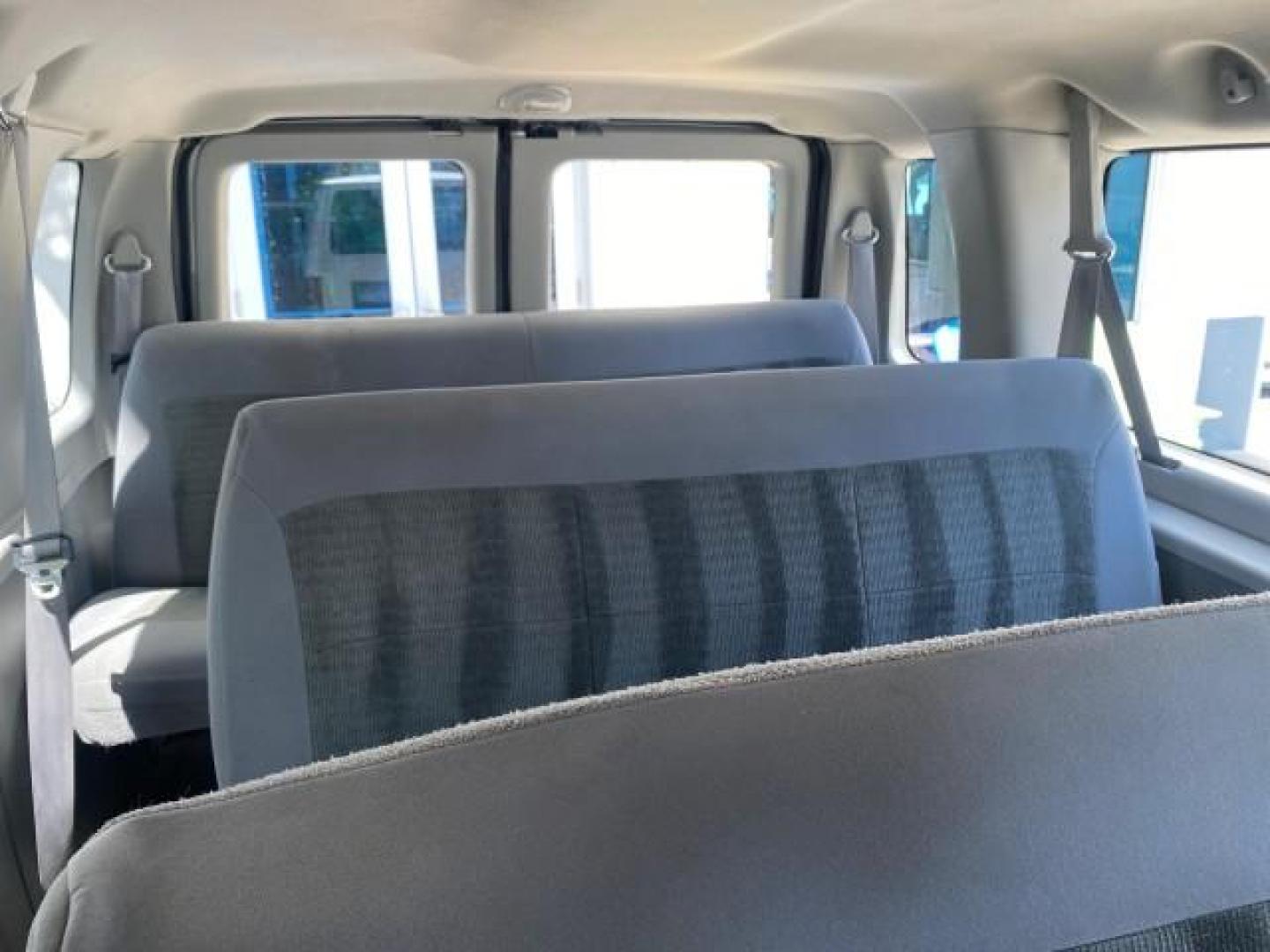 2005 Silver Metallic /Medium Flint Ford Econoline Wagon XLT E350 15 PASS LOW MILES 64,506 (1FBSS31L65H) with an 5.4L EFI V8 Engine engine, Automatic transmission, located at 4701 North Dixie Hwy, Pompano Beach, FL, 33064, (954) 422-2889, 26.240938, -80.123474 - OUR WEBPAGE FLORIDACARS1.COM HAS OVER 100 PHOTOS AND FREE CARFAX LINK 2005 FORD E-SERIES E-350 SD XLT WE HAVE 4 NEW TIRES INCLUDED VIN: 1FBSS31L65HA83248 1 F B S S 3 1 L 6 5 H A 8 3 2 4 8 VAN 5.4L V8 F TOW PKG WE ADDED NEW CLOTH HEADLINER SAGGING FROM AGE GASOLINE REAR WHEEL DRIVE Top Features Cloth - Photo#93