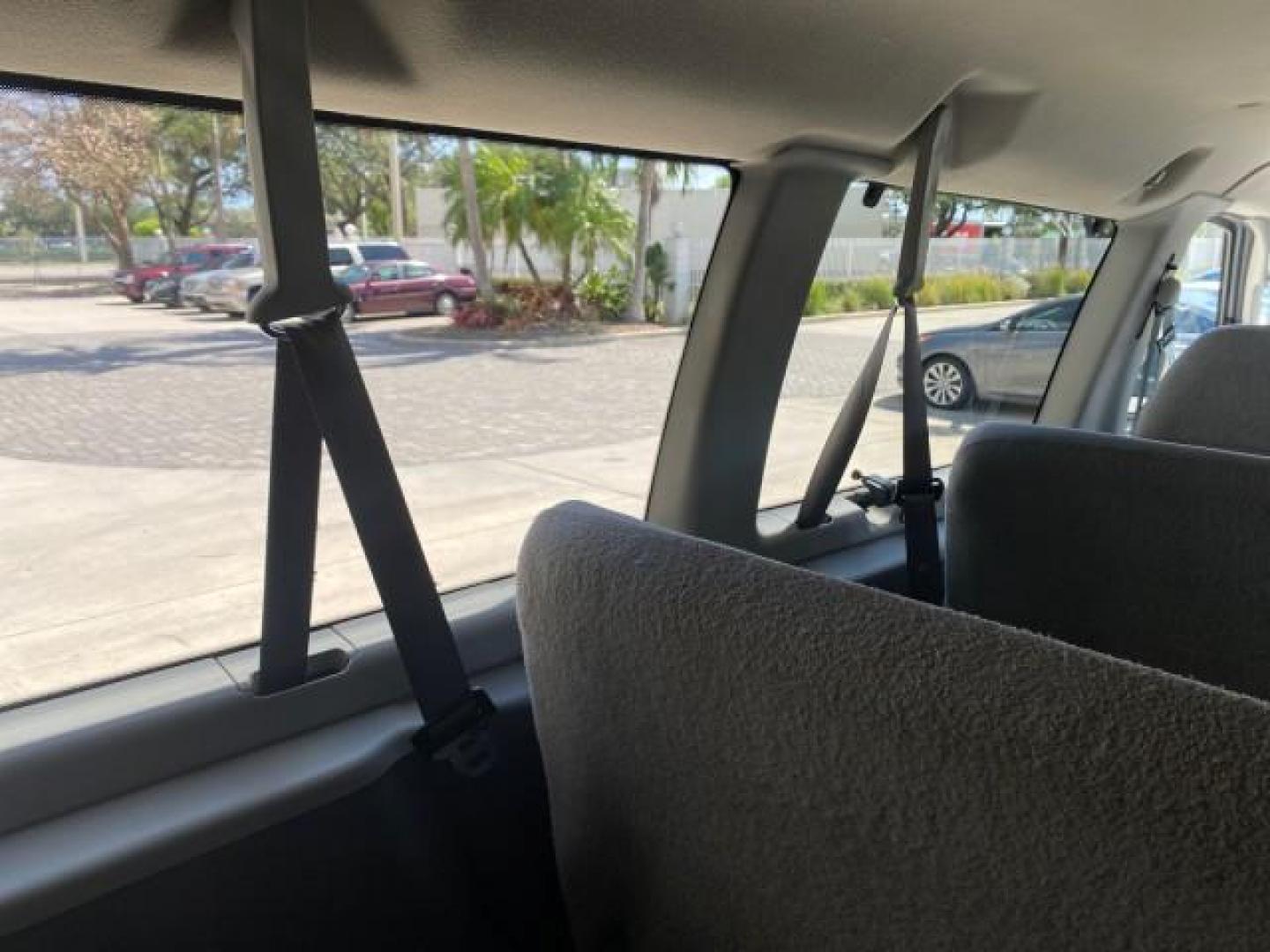 2005 Silver Metallic /Medium Flint Ford Econoline Wagon XLT E350 15 PASS LOW MILES 64,506 (1FBSS31L65H) with an 5.4L EFI V8 Engine engine, Automatic transmission, located at 4701 North Dixie Hwy, Pompano Beach, FL, 33064, (954) 422-2889, 26.240938, -80.123474 - OUR WEBPAGE FLORIDACARS1.COM HAS OVER 100 PHOTOS AND FREE CARFAX LINK 2005 FORD E-SERIES E-350 SD XLT WE HAVE 4 NEW TIRES INCLUDED VIN: 1FBSS31L65HA83248 1 F B S S 3 1 L 6 5 H A 8 3 2 4 8 VAN 5.4L V8 F TOW PKG WE ADDED NEW CLOTH HEADLINER SAGGING FROM AGE GASOLINE REAR WHEEL DRIVE Top Features Cloth - Photo#97