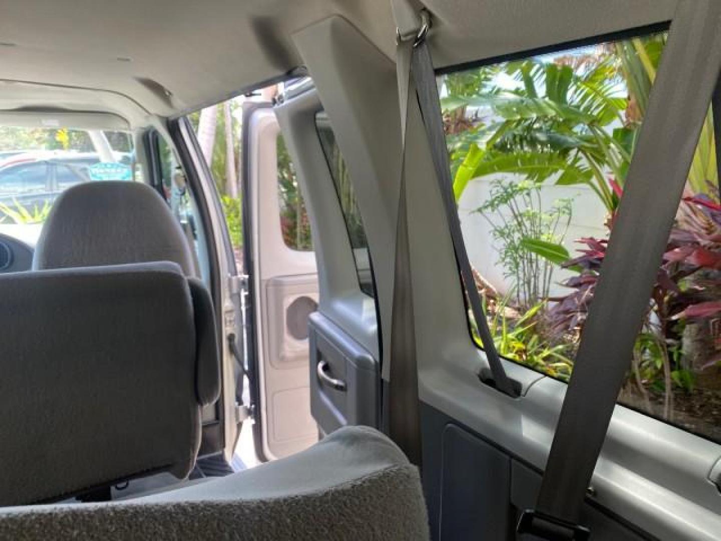 2005 Silver Metallic /Medium Flint Ford Econoline Wagon XLT E350 15 PASS LOW MILES 64,506 (1FBSS31L65H) with an 5.4L EFI V8 Engine engine, Automatic transmission, located at 4701 North Dixie Hwy, Pompano Beach, FL, 33064, (954) 422-2889, 26.240938, -80.123474 - OUR WEBPAGE FLORIDACARS1.COM HAS OVER 100 PHOTOS AND FREE CARFAX LINK 2005 FORD E-SERIES E-350 SD XLT WE HAVE 4 NEW TIRES INCLUDED VIN: 1FBSS31L65HA83248 1 F B S S 3 1 L 6 5 H A 8 3 2 4 8 VAN 5.4L V8 F TOW PKG WE ADDED NEW CLOTH HEADLINER SAGGING FROM AGE GASOLINE REAR WHEEL DRIVE Top Features Cloth - Photo#98