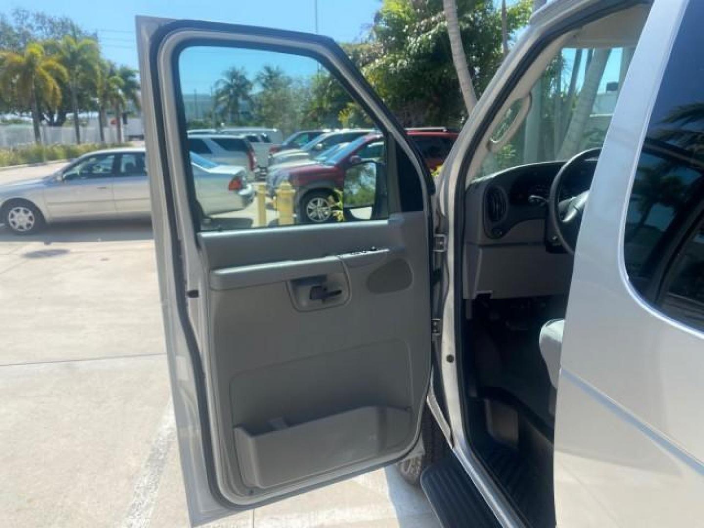 2005 Silver Metallic /Medium Flint Ford Econoline Wagon XLT E350 15 PASS LOW MILES 64,506 (1FBSS31L65H) with an 5.4L EFI V8 Engine engine, Automatic transmission, located at 4701 North Dixie Hwy, Pompano Beach, FL, 33064, (954) 422-2889, 26.240938, -80.123474 - OUR WEBPAGE FLORIDACARS1.COM HAS OVER 100 PHOTOS AND FREE CARFAX LINK 2005 FORD E-SERIES E-350 SD XLT WE HAVE 4 NEW TIRES INCLUDED VIN: 1FBSS31L65HA83248 1 F B S S 3 1 L 6 5 H A 8 3 2 4 8 VAN 5.4L V8 F TOW PKG WE ADDED NEW CLOTH HEADLINER SAGGING FROM AGE GASOLINE REAR WHEEL DRIVE Top Features Cloth - Photo#9