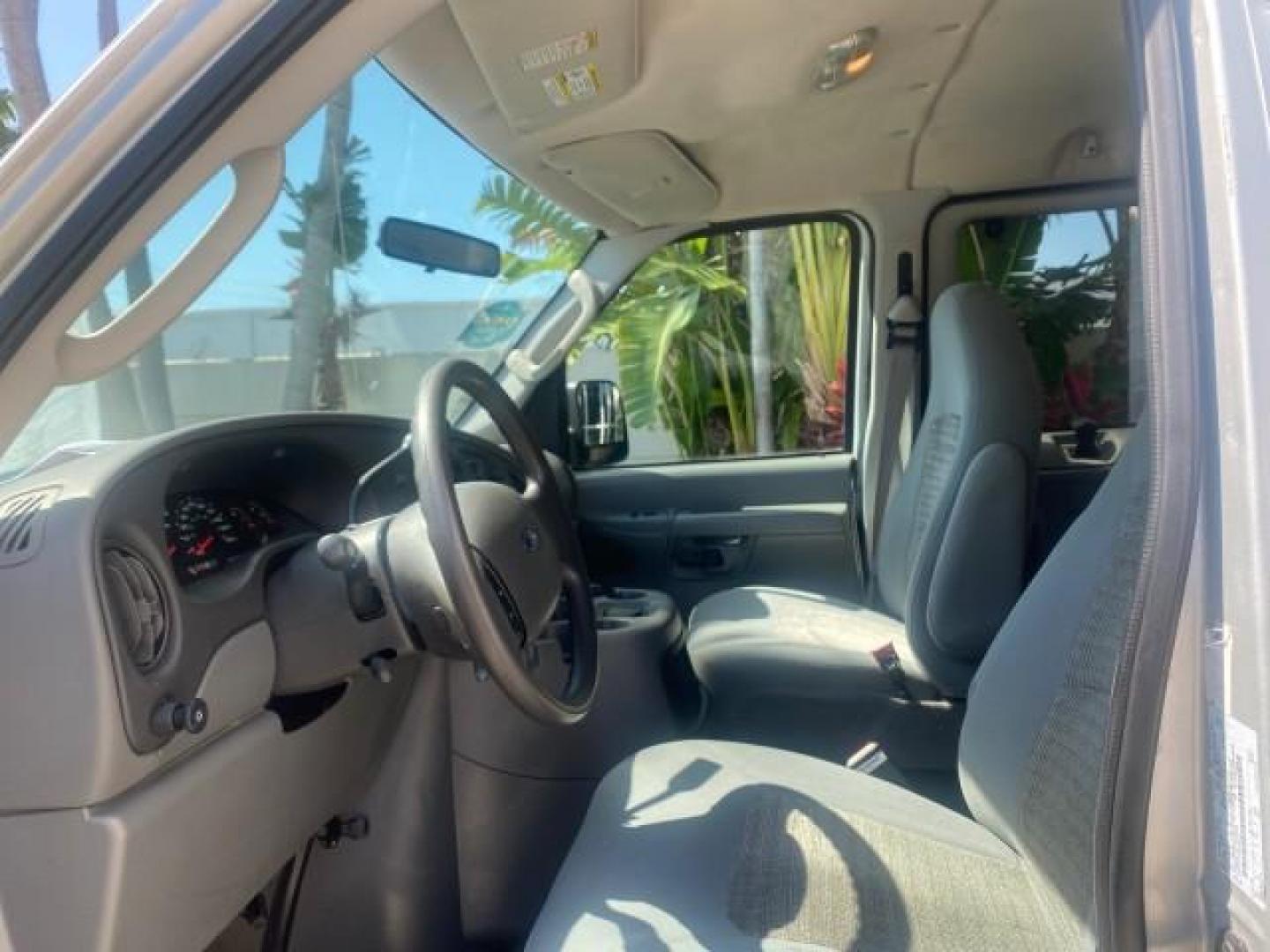 2005 Silver Metallic /Medium Flint Ford Econoline Wagon XLT E350 15 PASS LOW MILES 64,506 (1FBSS31L65H) with an 5.4L EFI V8 Engine engine, Automatic transmission, located at 4701 North Dixie Hwy, Pompano Beach, FL, 33064, (954) 422-2889, 26.240938, -80.123474 - OUR WEBPAGE FLORIDACARS1.COM HAS OVER 100 PHOTOS AND FREE CARFAX LINK 2005 FORD E-SERIES E-350 SD XLT WE HAVE 4 NEW TIRES INCLUDED VIN: 1FBSS31L65HA83248 1 F B S S 3 1 L 6 5 H A 8 3 2 4 8 VAN 5.4L V8 F TOW PKG WE ADDED NEW CLOTH HEADLINER SAGGING FROM AGE GASOLINE REAR WHEEL DRIVE Top Features Cloth - Photo#10
