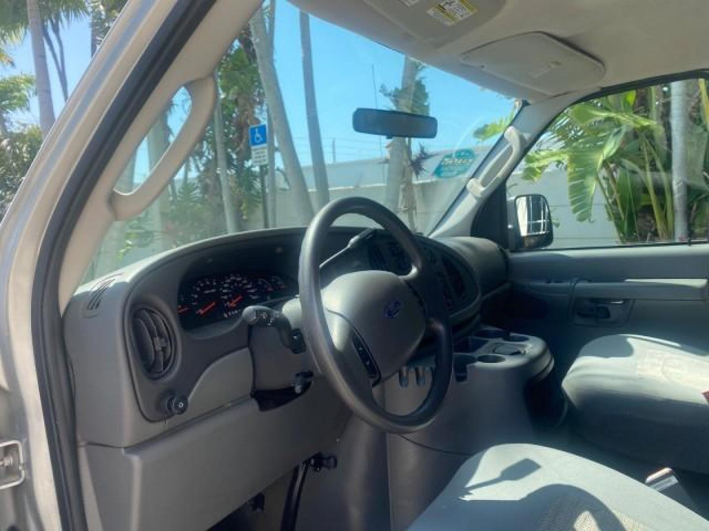 2005 Silver Metallic /Medium Flint Ford Econoline Wagon XLT E350 15 PASS LOW MILES 64,506 (1FBSS31L65H) with an 5.4L EFI V8 Engine engine, Automatic transmission, located at 4701 North Dixie Hwy, Pompano Beach, FL, 33064, (954) 422-2889, 26.240938, -80.123474 - OUR WEBPAGE FLORIDACARS1.COM HAS OVER 100 PHOTOS AND FREE CARFAX LINK 2005 FORD E-SERIES E-350 SD XLT WE HAVE 4 NEW TIRES INCLUDED VIN: 1FBSS31L65HA83248 1 F B S S 3 1 L 6 5 H A 8 3 2 4 8 VAN 5.4L V8 F TOW PKG WE ADDED NEW CLOTH HEADLINER SAGGING FROM AGE GASOLINE REAR WHEEL DRIVE Top Features Cloth - Photo#35