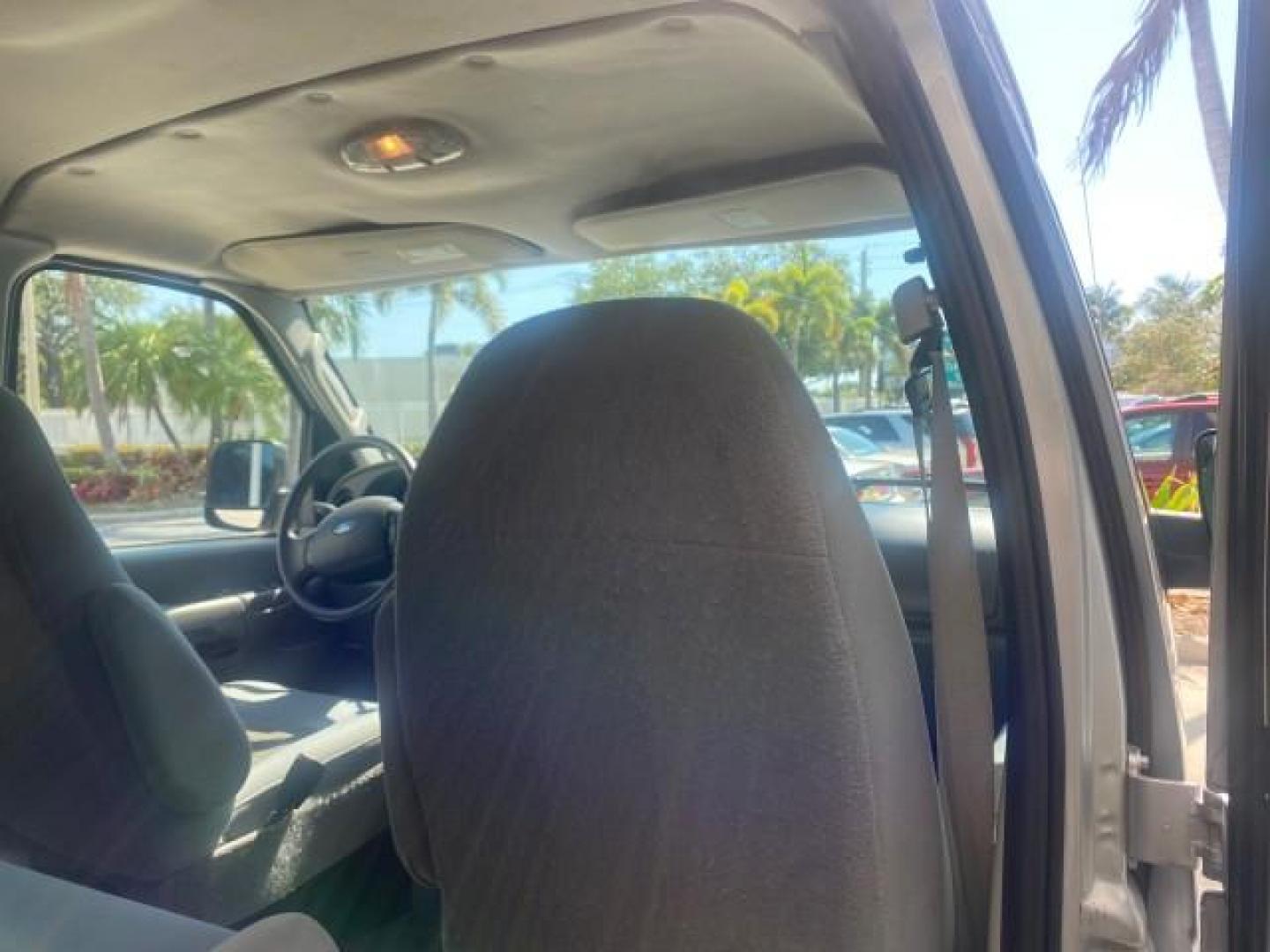 2005 Silver Metallic /Medium Flint Ford Econoline Wagon XLT E350 15 PASS LOW MILES 64,506 (1FBSS31L65H) with an 5.4L EFI V8 Engine engine, Automatic transmission, located at 4701 North Dixie Hwy, Pompano Beach, FL, 33064, (954) 422-2889, 26.240938, -80.123474 - OUR WEBPAGE FLORIDACARS1.COM HAS OVER 100 PHOTOS AND FREE CARFAX LINK 2005 FORD E-SERIES E-350 SD XLT WE HAVE 4 NEW TIRES INCLUDED VIN: 1FBSS31L65HA83248 1 F B S S 3 1 L 6 5 H A 8 3 2 4 8 VAN 5.4L V8 F TOW PKG WE ADDED NEW CLOTH HEADLINER SAGGING FROM AGE GASOLINE REAR WHEEL DRIVE Top Features Cloth - Photo#74