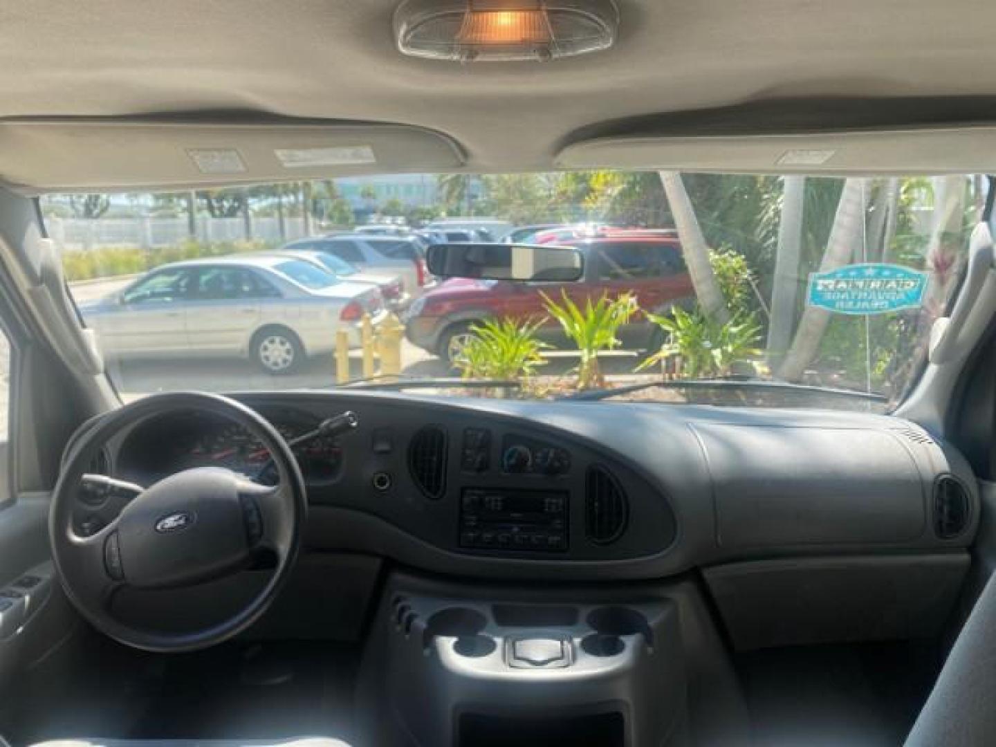 2005 Silver Metallic /Medium Flint Ford Econoline Wagon XLT E350 15 PASS LOW MILES 64,506 (1FBSS31L65H) with an 5.4L EFI V8 Engine engine, Automatic transmission, located at 4701 North Dixie Hwy, Pompano Beach, FL, 33064, (954) 422-2889, 26.240938, -80.123474 - OUR WEBPAGE FLORIDACARS1.COM HAS OVER 100 PHOTOS AND FREE CARFAX LINK 2005 FORD E-SERIES E-350 SD XLT WE HAVE 4 NEW TIRES INCLUDED VIN: 1FBSS31L65HA83248 1 F B S S 3 1 L 6 5 H A 8 3 2 4 8 VAN 5.4L V8 F TOW PKG WE ADDED NEW CLOTH HEADLINER SAGGING FROM AGE GASOLINE REAR WHEEL DRIVE Top Features Cloth - Photo#82