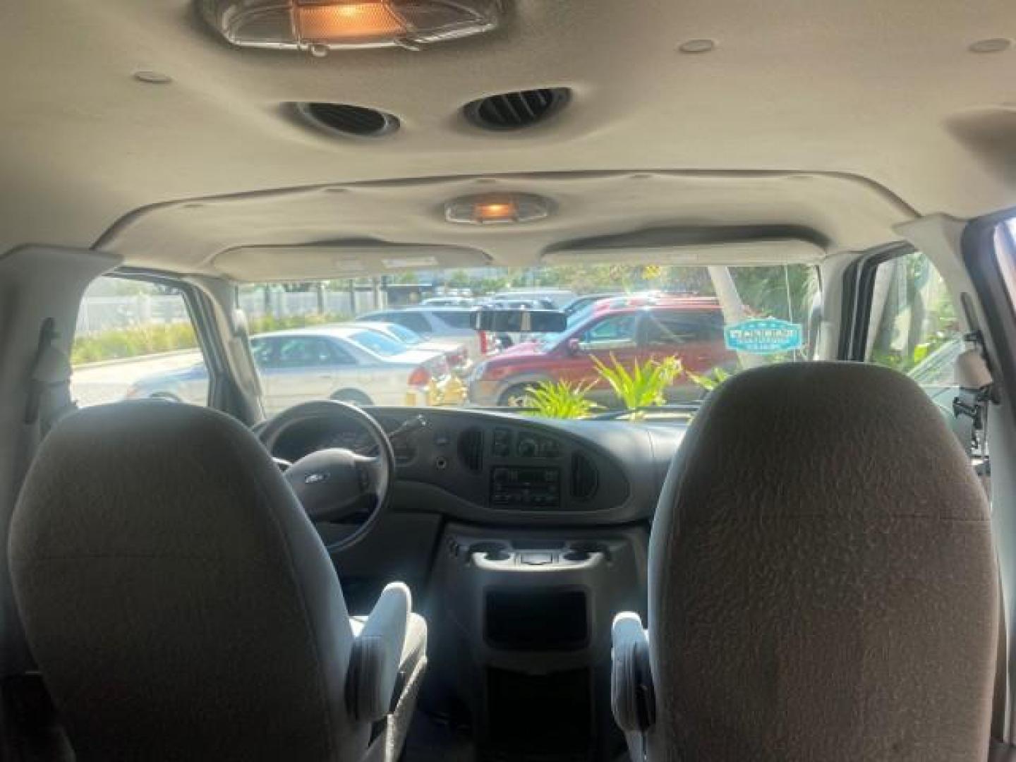 2005 Silver Metallic /Medium Flint Ford Econoline Wagon XLT E350 15 PASS LOW MILES 64,506 (1FBSS31L65H) with an 5.4L EFI V8 Engine engine, Automatic transmission, located at 4701 North Dixie Hwy, Pompano Beach, FL, 33064, (954) 422-2889, 26.240938, -80.123474 - OUR WEBPAGE FLORIDACARS1.COM HAS OVER 100 PHOTOS AND FREE CARFAX LINK 2005 FORD E-SERIES E-350 SD XLT WE HAVE 4 NEW TIRES INCLUDED VIN: 1FBSS31L65HA83248 1 F B S S 3 1 L 6 5 H A 8 3 2 4 8 VAN 5.4L V8 F TOW PKG WE ADDED NEW CLOTH HEADLINER SAGGING FROM AGE GASOLINE REAR WHEEL DRIVE Top Features Cloth - Photo#84