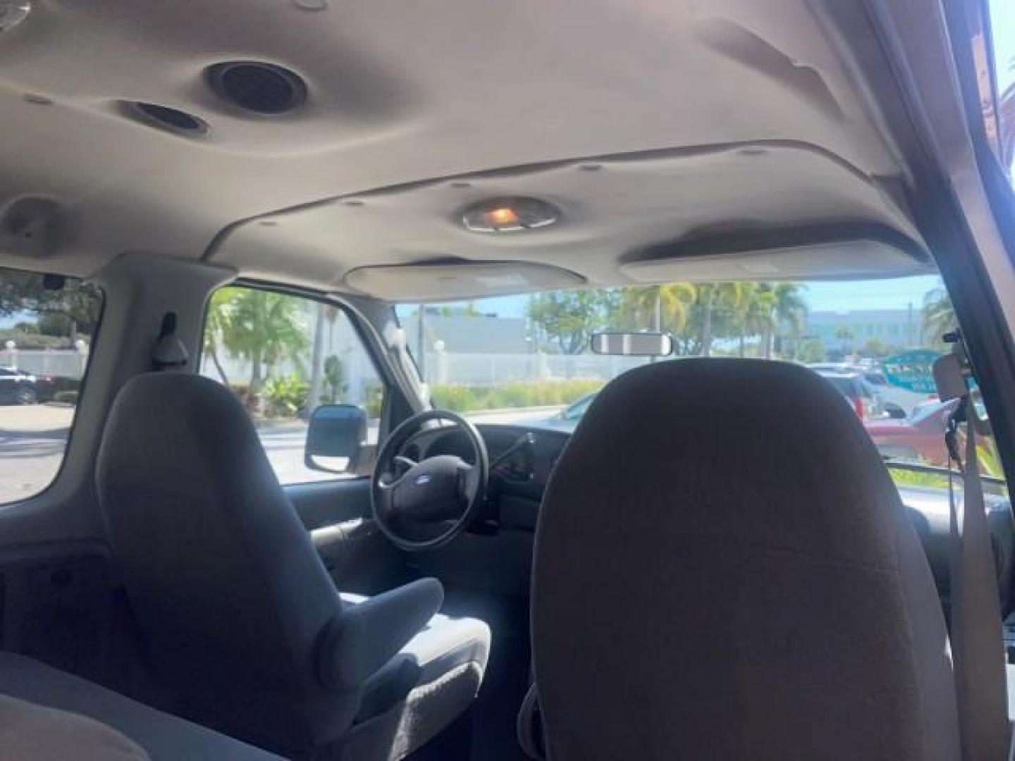 2005 Silver Metallic /Medium Flint Ford Econoline Wagon XLT E350 15 PASS LOW MILES 64,506 (1FBSS31L65H) with an 5.4L EFI V8 Engine engine, Automatic transmission, located at 4701 North Dixie Hwy, Pompano Beach, FL, 33064, (954) 422-2889, 26.240938, -80.123474 - OUR WEBPAGE FLORIDACARS1.COM HAS OVER 100 PHOTOS AND FREE CARFAX LINK 2005 FORD E-SERIES E-350 SD XLT WE HAVE 4 NEW TIRES INCLUDED VIN: 1FBSS31L65HA83248 1 F B S S 3 1 L 6 5 H A 8 3 2 4 8 VAN 5.4L V8 F TOW PKG WE ADDED NEW CLOTH HEADLINER SAGGING FROM AGE GASOLINE REAR WHEEL DRIVE Top Features Cloth - Photo#86