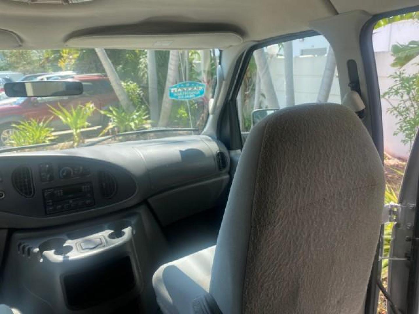 2005 Silver Metallic /Medium Flint Ford Econoline Wagon XLT E350 15 PASS LOW MILES 64,506 (1FBSS31L65H) with an 5.4L EFI V8 Engine engine, Automatic transmission, located at 4701 North Dixie Hwy, Pompano Beach, FL, 33064, (954) 422-2889, 26.240938, -80.123474 - OUR WEBPAGE FLORIDACARS1.COM HAS OVER 100 PHOTOS AND FREE CARFAX LINK 2005 FORD E-SERIES E-350 SD XLT WE HAVE 4 NEW TIRES INCLUDED VIN: 1FBSS31L65HA83248 1 F B S S 3 1 L 6 5 H A 8 3 2 4 8 VAN 5.4L V8 F TOW PKG WE ADDED NEW CLOTH HEADLINER SAGGING FROM AGE GASOLINE REAR WHEEL DRIVE Top Features Cloth - Photo#87
