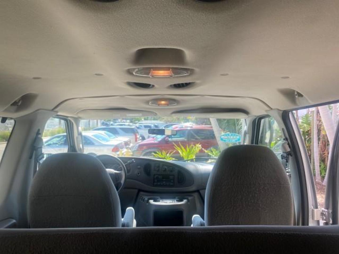 2005 Silver Metallic /Medium Flint Ford Econoline Wagon XLT E350 15 PASS LOW MILES 64,506 (1FBSS31L65H) with an 5.4L EFI V8 Engine engine, Automatic transmission, located at 4701 North Dixie Hwy, Pompano Beach, FL, 33064, (954) 422-2889, 26.240938, -80.123474 - OUR WEBPAGE FLORIDACARS1.COM HAS OVER 100 PHOTOS AND FREE CARFAX LINK 2005 FORD E-SERIES E-350 SD XLT WE HAVE 4 NEW TIRES INCLUDED VIN: 1FBSS31L65HA83248 1 F B S S 3 1 L 6 5 H A 8 3 2 4 8 VAN 5.4L V8 F TOW PKG WE ADDED NEW CLOTH HEADLINER SAGGING FROM AGE GASOLINE REAR WHEEL DRIVE Top Features Cloth - Photo#92