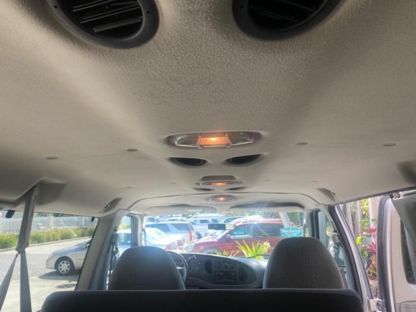 2005 Silver Metallic /Medium Flint Ford Econoline Wagon XLT E350 15 PASS LOW MILES 64,506 (1FBSS31L65H) with an 5.4L EFI V8 Engine engine, Automatic transmission, located at 4701 North Dixie Hwy, Pompano Beach, FL, 33064, (954) 422-2889, 26.240938, -80.123474 - OUR WEBPAGE FLORIDACARS1.COM HAS OVER 100 PHOTOS AND FREE CARFAX LINK 2005 FORD E-SERIES E-350 SD XLT WE HAVE 4 NEW TIRES INCLUDED VIN: 1FBSS31L65HA83248 1 F B S S 3 1 L 6 5 H A 8 3 2 4 8 VAN 5.4L V8 F TOW PKG WE ADDED NEW CLOTH HEADLINER SAGGING FROM AGE GASOLINE REAR WHEEL DRIVE Top Features Cloth - Photo#95
