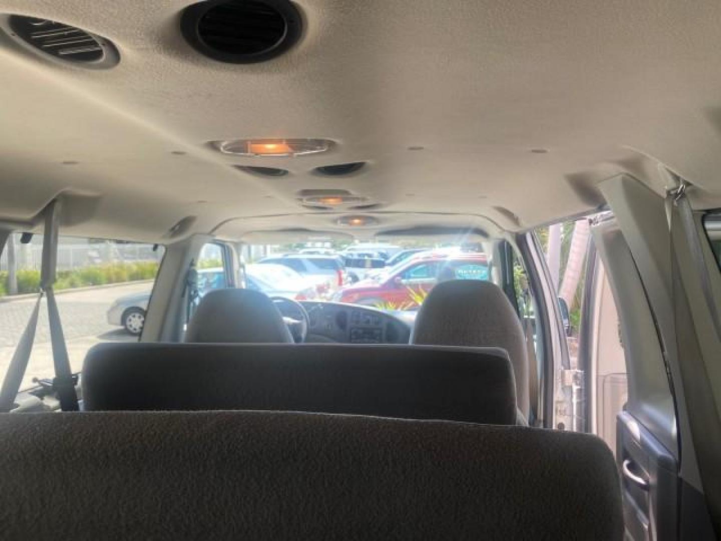 2005 Silver Metallic /Medium Flint Ford Econoline Wagon XLT E350 15 PASS LOW MILES 64,506 (1FBSS31L65H) with an 5.4L EFI V8 Engine engine, Automatic transmission, located at 4701 North Dixie Hwy, Pompano Beach, FL, 33064, (954) 422-2889, 26.240938, -80.123474 - OUR WEBPAGE FLORIDACARS1.COM HAS OVER 100 PHOTOS AND FREE CARFAX LINK 2005 FORD E-SERIES E-350 SD XLT WE HAVE 4 NEW TIRES INCLUDED VIN: 1FBSS31L65HA83248 1 F B S S 3 1 L 6 5 H A 8 3 2 4 8 VAN 5.4L V8 F TOW PKG WE ADDED NEW CLOTH HEADLINER SAGGING FROM AGE GASOLINE REAR WHEEL DRIVE Top Features Cloth - Photo#96