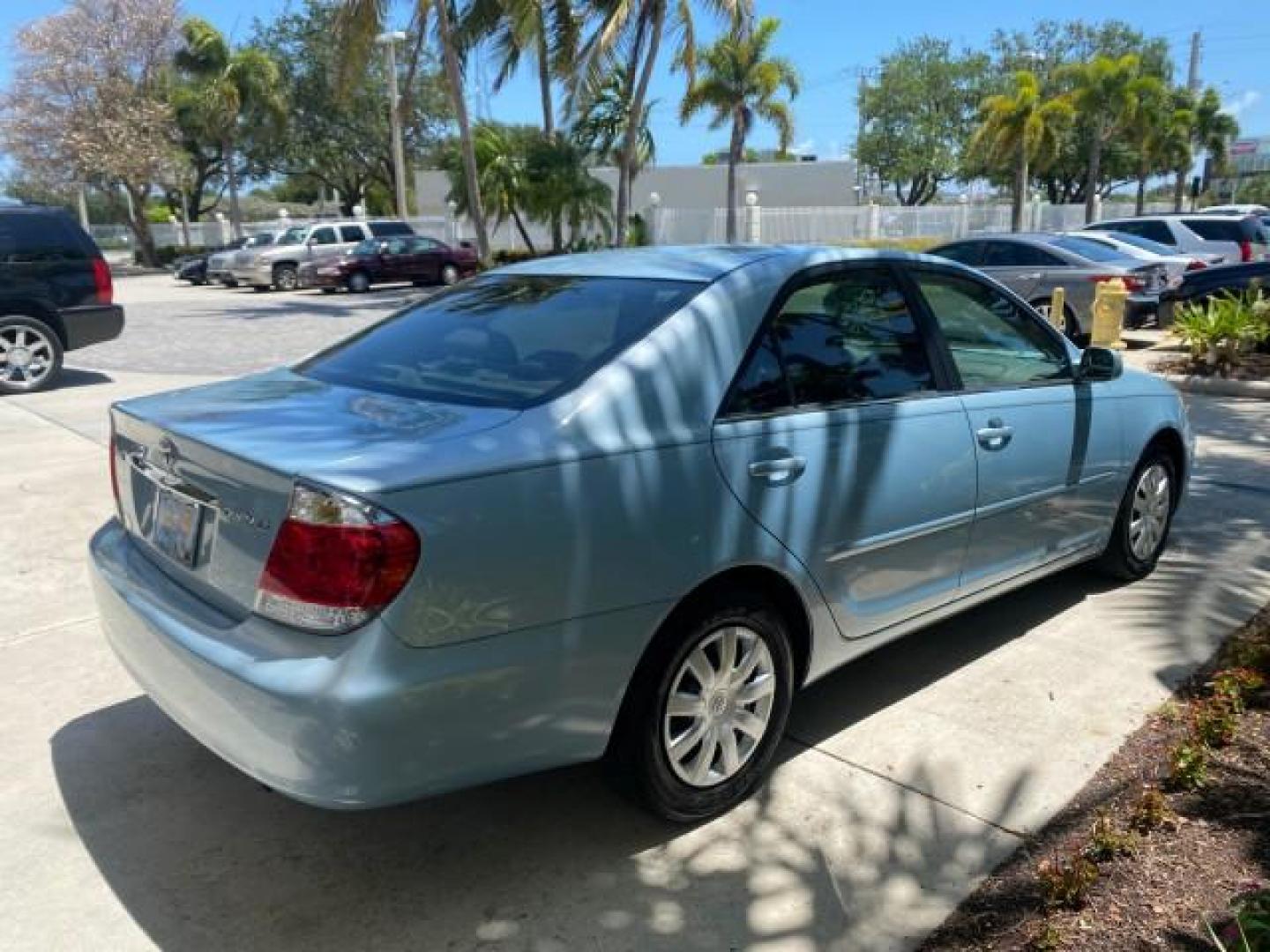 2005 Sky Blue Pearl /Stone Toyota Camry LE FL LOW MILES SUNROOF LEATHER (4T1BE32K25U) with an 2.4L DOHC SEFI Vvti 16-Valve 4-Cyl Engine engine, Automatic transmission, located at 4701 North Dixie Hwy, Pompano Beach, FL, 33064, (954) 422-2889, 26.240938, -80.123474 - OUR WEBPAGE FLORIDACARS1.COM HAS OVER 100 PHOTOS AND FREE CARFAX LINK 2005 TOYOTA CAMRY LE SUNROOF LEATHER VIN: 4T1BE32K25U531416 4 T 1 B E 3 2 K 2 5 U 5 3 1 4 1 6 SEDAN 4 DR 2.4L I4 F DOHC 16V 4 CYL 34 MPG GASOLINE FRONT WHEEL DRIVE Top Features JBL Sound System Leather Seats Basic Features ABS Bra - Photo#7