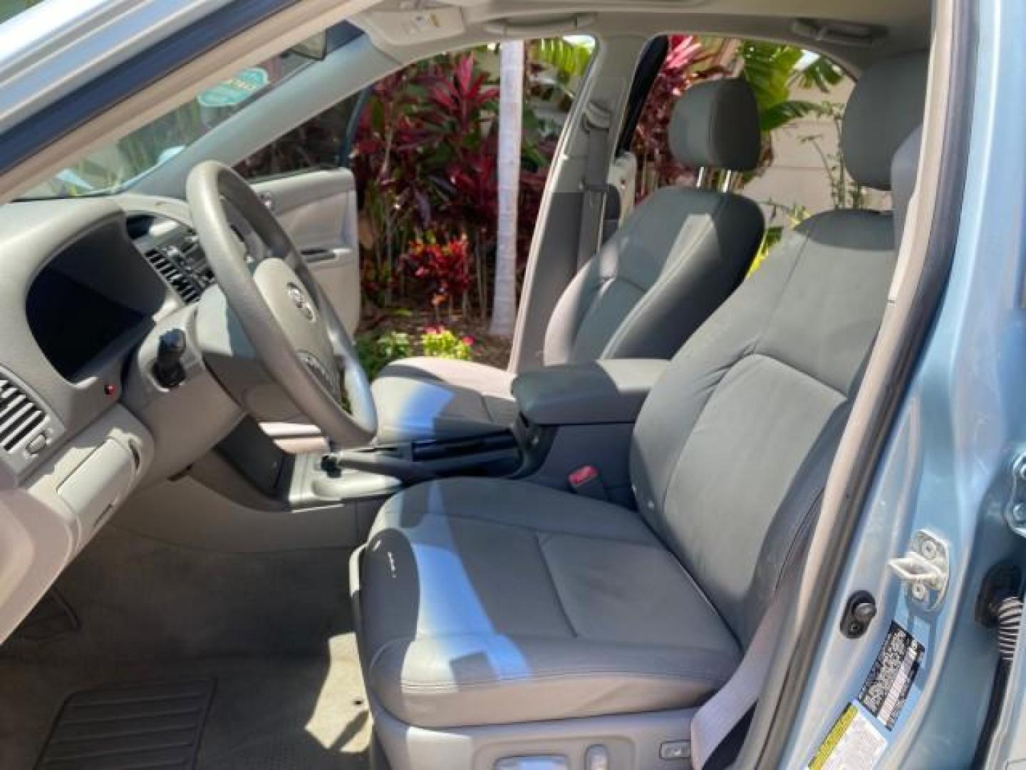 2005 Sky Blue Pearl /Stone Toyota Camry LE FL LOW MILES SUNROOF LEATHER (4T1BE32K25U) with an 2.4L DOHC SEFI Vvti 16-Valve 4-Cyl Engine engine, Automatic transmission, located at 4701 North Dixie Hwy, Pompano Beach, FL, 33064, (954) 422-2889, 26.240938, -80.123474 - OUR WEBPAGE FLORIDACARS1.COM HAS OVER 100 PHOTOS AND FREE CARFAX LINK 2005 TOYOTA CAMRY LE SUNROOF LEATHER VIN: 4T1BE32K25U531416 4 T 1 B E 3 2 K 2 5 U 5 3 1 4 1 6 SEDAN 4 DR 2.4L I4 F DOHC 16V 4 CYL 34 MPG GASOLINE FRONT WHEEL DRIVE Top Features JBL Sound System Leather Seats Basic Features ABS Bra - Photo#10