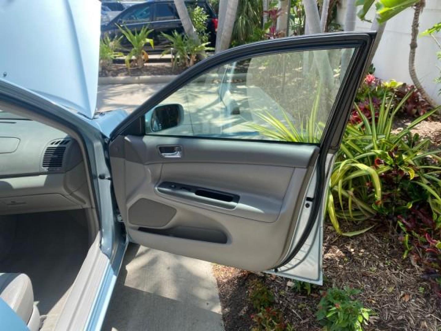 2005 Sky Blue Pearl /Stone Toyota Camry LE FL LOW MILES SUNROOF LEATHER (4T1BE32K25U) with an 2.4L DOHC SEFI Vvti 16-Valve 4-Cyl Engine engine, Automatic transmission, located at 4701 North Dixie Hwy, Pompano Beach, FL, 33064, (954) 422-2889, 26.240938, -80.123474 - OUR WEBPAGE FLORIDACARS1.COM HAS OVER 100 PHOTOS AND FREE CARFAX LINK 2005 TOYOTA CAMRY LE SUNROOF LEATHER VIN: 4T1BE32K25U531416 4 T 1 B E 3 2 K 2 5 U 5 3 1 4 1 6 SEDAN 4 DR 2.4L I4 F DOHC 16V 4 CYL 34 MPG GASOLINE FRONT WHEEL DRIVE Top Features JBL Sound System Leather Seats Basic Features ABS Bra - Photo#11