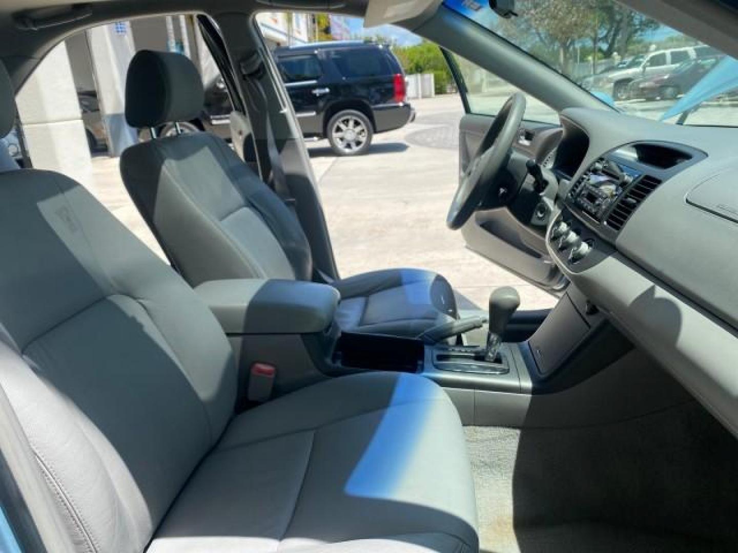 2005 Sky Blue Pearl /Stone Toyota Camry LE FL LOW MILES SUNROOF LEATHER (4T1BE32K25U) with an 2.4L DOHC SEFI Vvti 16-Valve 4-Cyl Engine engine, Automatic transmission, located at 4701 North Dixie Hwy, Pompano Beach, FL, 33064, (954) 422-2889, 26.240938, -80.123474 - OUR WEBPAGE FLORIDACARS1.COM HAS OVER 100 PHOTOS AND FREE CARFAX LINK 2005 TOYOTA CAMRY LE SUNROOF LEATHER VIN: 4T1BE32K25U531416 4 T 1 B E 3 2 K 2 5 U 5 3 1 4 1 6 SEDAN 4 DR 2.4L I4 F DOHC 16V 4 CYL 34 MPG GASOLINE FRONT WHEEL DRIVE Top Features JBL Sound System Leather Seats Basic Features ABS Bra - Photo#12