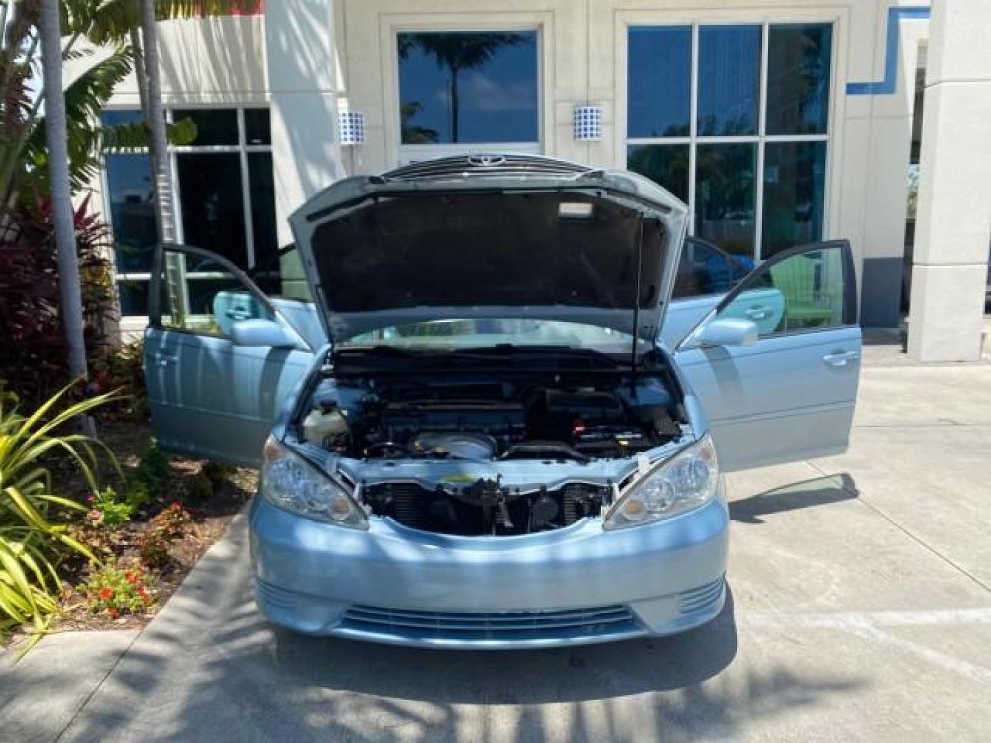 2005 Sky Blue Pearl /Stone Toyota Camry LE FL LOW MILES SUNROOF LEATHER (4T1BE32K25U) with an 2.4L DOHC SEFI Vvti 16-Valve 4-Cyl Engine engine, Automatic transmission, located at 4701 North Dixie Hwy, Pompano Beach, FL, 33064, (954) 422-2889, 26.240938, -80.123474 - OUR WEBPAGE FLORIDACARS1.COM HAS OVER 100 PHOTOS AND FREE CARFAX LINK 2005 TOYOTA CAMRY LE SUNROOF LEATHER VIN: 4T1BE32K25U531416 4 T 1 B E 3 2 K 2 5 U 5 3 1 4 1 6 SEDAN 4 DR 2.4L I4 F DOHC 16V 4 CYL 34 MPG GASOLINE FRONT WHEEL DRIVE Top Features JBL Sound System Leather Seats Basic Features ABS Bra - Photo#16
