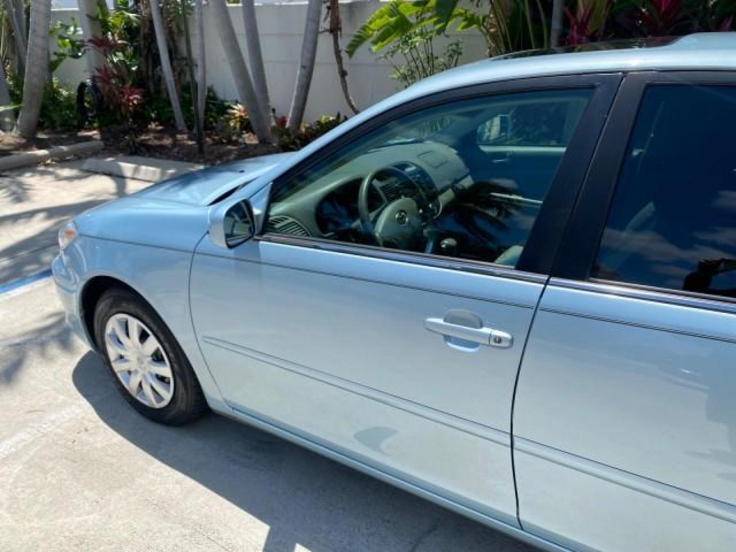2005 Sky Blue Pearl /Stone Toyota Camry LE FL LOW MILES SUNROOF LEATHER (4T1BE32K25U) with an 2.4L DOHC SEFI Vvti 16-Valve 4-Cyl Engine engine, Automatic transmission, located at 4701 North Dixie Hwy, Pompano Beach, FL, 33064, (954) 422-2889, 26.240938, -80.123474 - OUR WEBPAGE FLORIDACARS1.COM HAS OVER 100 PHOTOS AND FREE CARFAX LINK 2005 TOYOTA CAMRY LE SUNROOF LEATHER VIN: 4T1BE32K25U531416 4 T 1 B E 3 2 K 2 5 U 5 3 1 4 1 6 SEDAN 4 DR 2.4L I4 F DOHC 16V 4 CYL 34 MPG GASOLINE FRONT WHEEL DRIVE Top Features JBL Sound System Leather Seats Basic Features ABS Bra - Photo#27