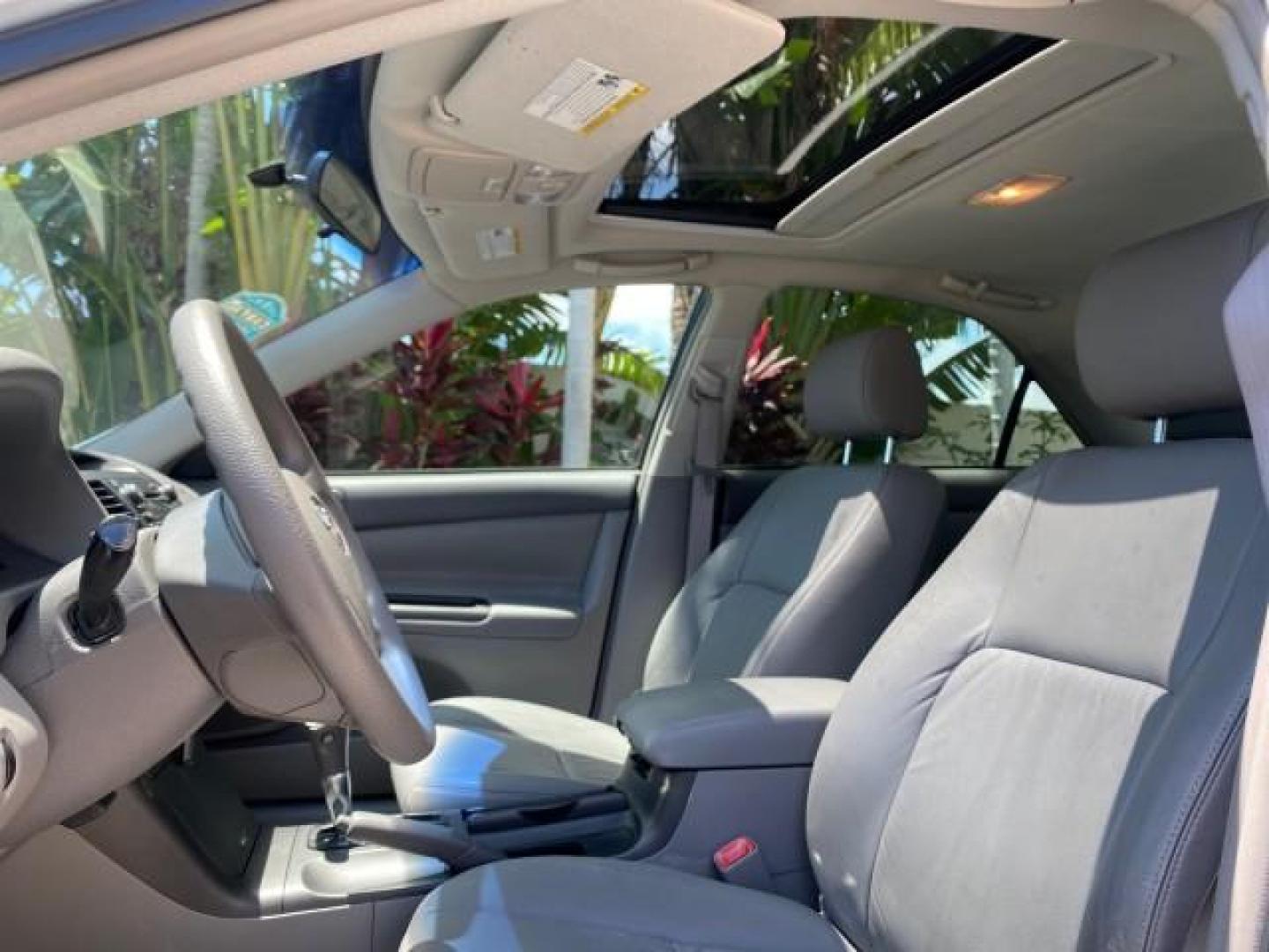 2005 Sky Blue Pearl /Stone Toyota Camry LE FL LOW MILES SUNROOF LEATHER (4T1BE32K25U) with an 2.4L DOHC SEFI Vvti 16-Valve 4-Cyl Engine engine, Automatic transmission, located at 4701 North Dixie Hwy, Pompano Beach, FL, 33064, (954) 422-2889, 26.240938, -80.123474 - OUR WEBPAGE FLORIDACARS1.COM HAS OVER 100 PHOTOS AND FREE CARFAX LINK 2005 TOYOTA CAMRY LE SUNROOF LEATHER VIN: 4T1BE32K25U531416 4 T 1 B E 3 2 K 2 5 U 5 3 1 4 1 6 SEDAN 4 DR 2.4L I4 F DOHC 16V 4 CYL 34 MPG GASOLINE FRONT WHEEL DRIVE Top Features JBL Sound System Leather Seats Basic Features ABS Bra - Photo#33