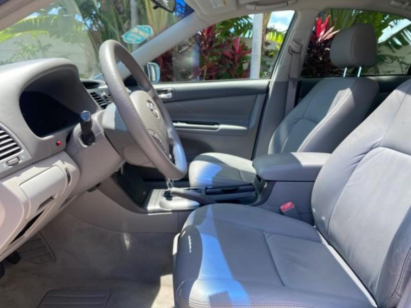 2005 Sky Blue Pearl /Stone Toyota Camry LE FL LOW MILES SUNROOF LEATHER (4T1BE32K25U) with an 2.4L DOHC SEFI Vvti 16-Valve 4-Cyl Engine engine, Automatic transmission, located at 4701 North Dixie Hwy, Pompano Beach, FL, 33064, (954) 422-2889, 26.240938, -80.123474 - OUR WEBPAGE FLORIDACARS1.COM HAS OVER 100 PHOTOS AND FREE CARFAX LINK 2005 TOYOTA CAMRY LE SUNROOF LEATHER VIN: 4T1BE32K25U531416 4 T 1 B E 3 2 K 2 5 U 5 3 1 4 1 6 SEDAN 4 DR 2.4L I4 F DOHC 16V 4 CYL 34 MPG GASOLINE FRONT WHEEL DRIVE Top Features JBL Sound System Leather Seats Basic Features ABS Bra - Photo#34