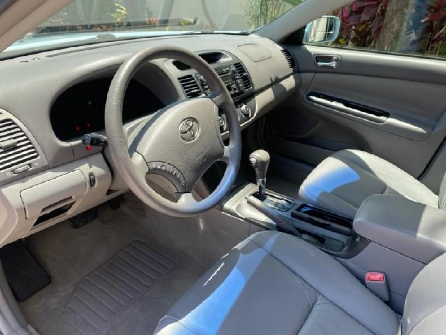 2005 Sky Blue Pearl /Stone Toyota Camry LE FL LOW MILES SUNROOF LEATHER (4T1BE32K25U) with an 2.4L DOHC SEFI Vvti 16-Valve 4-Cyl Engine engine, Automatic transmission, located at 4701 North Dixie Hwy, Pompano Beach, FL, 33064, (954) 422-2889, 26.240938, -80.123474 - OUR WEBPAGE FLORIDACARS1.COM HAS OVER 100 PHOTOS AND FREE CARFAX LINK 2005 TOYOTA CAMRY LE SUNROOF LEATHER VIN: 4T1BE32K25U531416 4 T 1 B E 3 2 K 2 5 U 5 3 1 4 1 6 SEDAN 4 DR 2.4L I4 F DOHC 16V 4 CYL 34 MPG GASOLINE FRONT WHEEL DRIVE Top Features JBL Sound System Leather Seats Basic Features ABS Bra - Photo#35