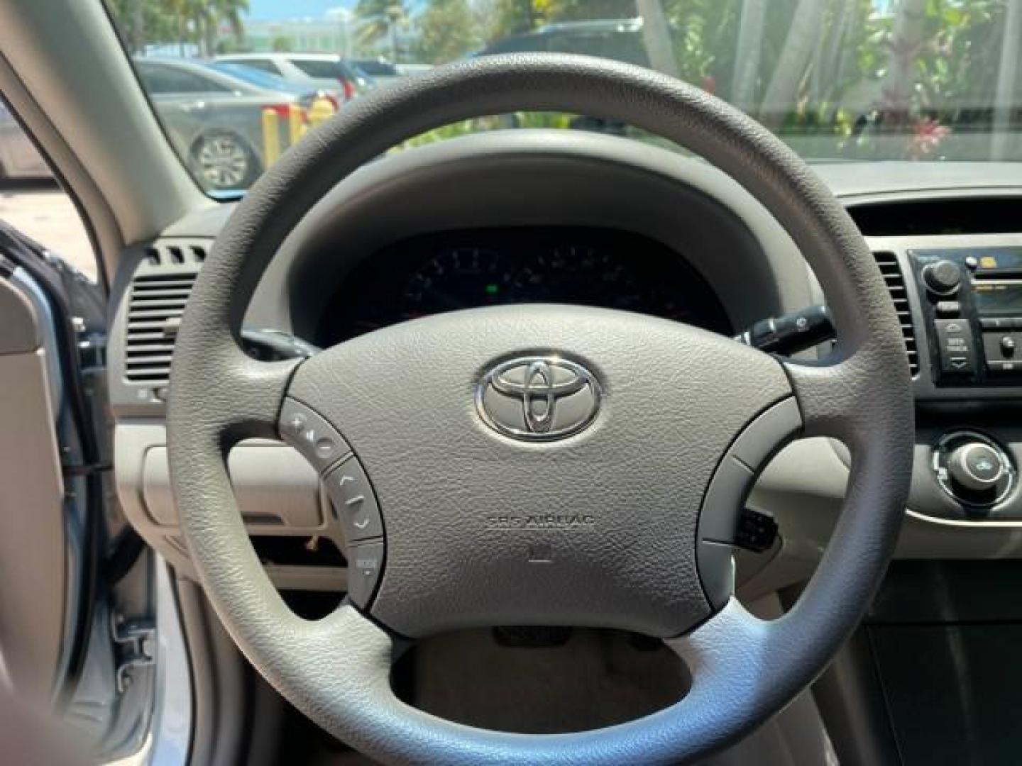 2005 Sky Blue Pearl /Stone Toyota Camry LE FL LOW MILES SUNROOF LEATHER (4T1BE32K25U) with an 2.4L DOHC SEFI Vvti 16-Valve 4-Cyl Engine engine, Automatic transmission, located at 4701 North Dixie Hwy, Pompano Beach, FL, 33064, (954) 422-2889, 26.240938, -80.123474 - OUR WEBPAGE FLORIDACARS1.COM HAS OVER 100 PHOTOS AND FREE CARFAX LINK 2005 TOYOTA CAMRY LE SUNROOF LEATHER VIN: 4T1BE32K25U531416 4 T 1 B E 3 2 K 2 5 U 5 3 1 4 1 6 SEDAN 4 DR 2.4L I4 F DOHC 16V 4 CYL 34 MPG GASOLINE FRONT WHEEL DRIVE Top Features JBL Sound System Leather Seats Basic Features ABS Bra - Photo#36