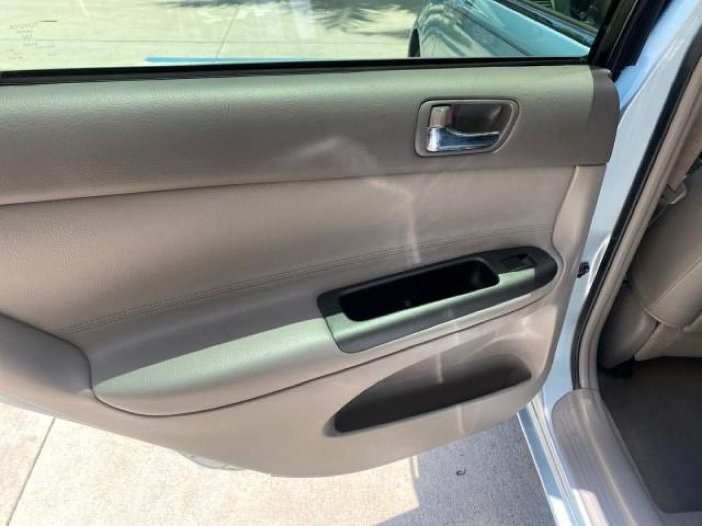 2005 Sky Blue Pearl /Stone Toyota Camry LE FL LOW MILES SUNROOF LEATHER (4T1BE32K25U) with an 2.4L DOHC SEFI Vvti 16-Valve 4-Cyl Engine engine, Automatic transmission, located at 4701 North Dixie Hwy, Pompano Beach, FL, 33064, (954) 422-2889, 26.240938, -80.123474 - OUR WEBPAGE FLORIDACARS1.COM HAS OVER 100 PHOTOS AND FREE CARFAX LINK 2005 TOYOTA CAMRY LE SUNROOF LEATHER VIN: 4T1BE32K25U531416 4 T 1 B E 3 2 K 2 5 U 5 3 1 4 1 6 SEDAN 4 DR 2.4L I4 F DOHC 16V 4 CYL 34 MPG GASOLINE FRONT WHEEL DRIVE Top Features JBL Sound System Leather Seats Basic Features ABS Bra - Photo#61