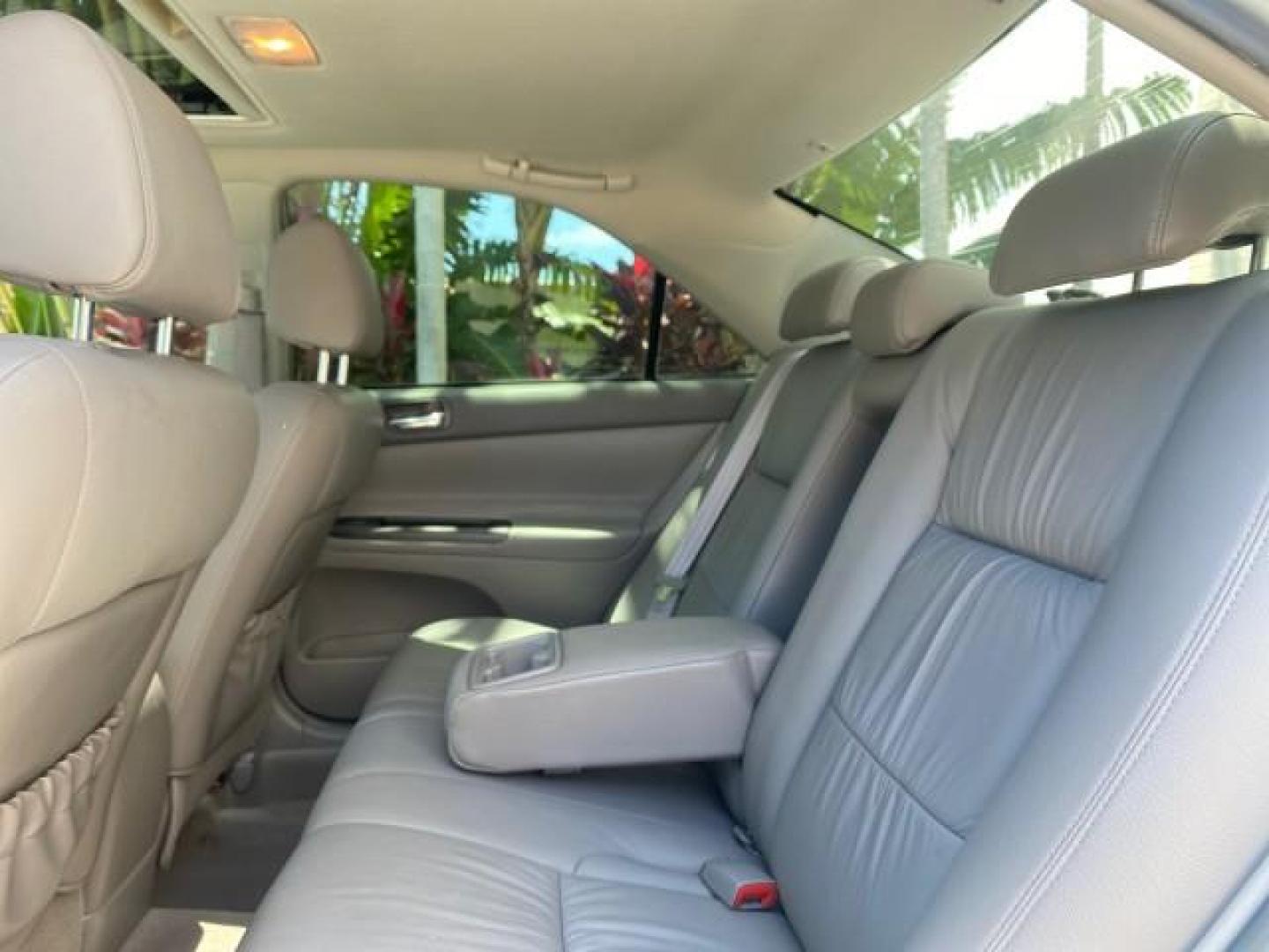 2005 Sky Blue Pearl /Stone Toyota Camry LE FL LOW MILES SUNROOF LEATHER (4T1BE32K25U) with an 2.4L DOHC SEFI Vvti 16-Valve 4-Cyl Engine engine, Automatic transmission, located at 4701 North Dixie Hwy, Pompano Beach, FL, 33064, (954) 422-2889, 26.240938, -80.123474 - OUR WEBPAGE FLORIDACARS1.COM HAS OVER 100 PHOTOS AND FREE CARFAX LINK 2005 TOYOTA CAMRY LE SUNROOF LEATHER VIN: 4T1BE32K25U531416 4 T 1 B E 3 2 K 2 5 U 5 3 1 4 1 6 SEDAN 4 DR 2.4L I4 F DOHC 16V 4 CYL 34 MPG GASOLINE FRONT WHEEL DRIVE Top Features JBL Sound System Leather Seats Basic Features ABS Bra - Photo#62