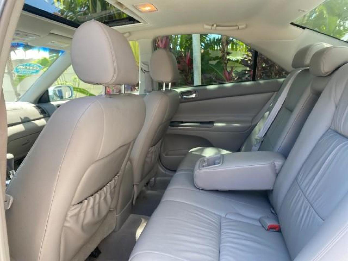 2005 Sky Blue Pearl /Stone Toyota Camry LE FL LOW MILES SUNROOF LEATHER (4T1BE32K25U) with an 2.4L DOHC SEFI Vvti 16-Valve 4-Cyl Engine engine, Automatic transmission, located at 4701 North Dixie Hwy, Pompano Beach, FL, 33064, (954) 422-2889, 26.240938, -80.123474 - OUR WEBPAGE FLORIDACARS1.COM HAS OVER 100 PHOTOS AND FREE CARFAX LINK 2005 TOYOTA CAMRY LE SUNROOF LEATHER VIN: 4T1BE32K25U531416 4 T 1 B E 3 2 K 2 5 U 5 3 1 4 1 6 SEDAN 4 DR 2.4L I4 F DOHC 16V 4 CYL 34 MPG GASOLINE FRONT WHEEL DRIVE Top Features JBL Sound System Leather Seats Basic Features ABS Bra - Photo#63