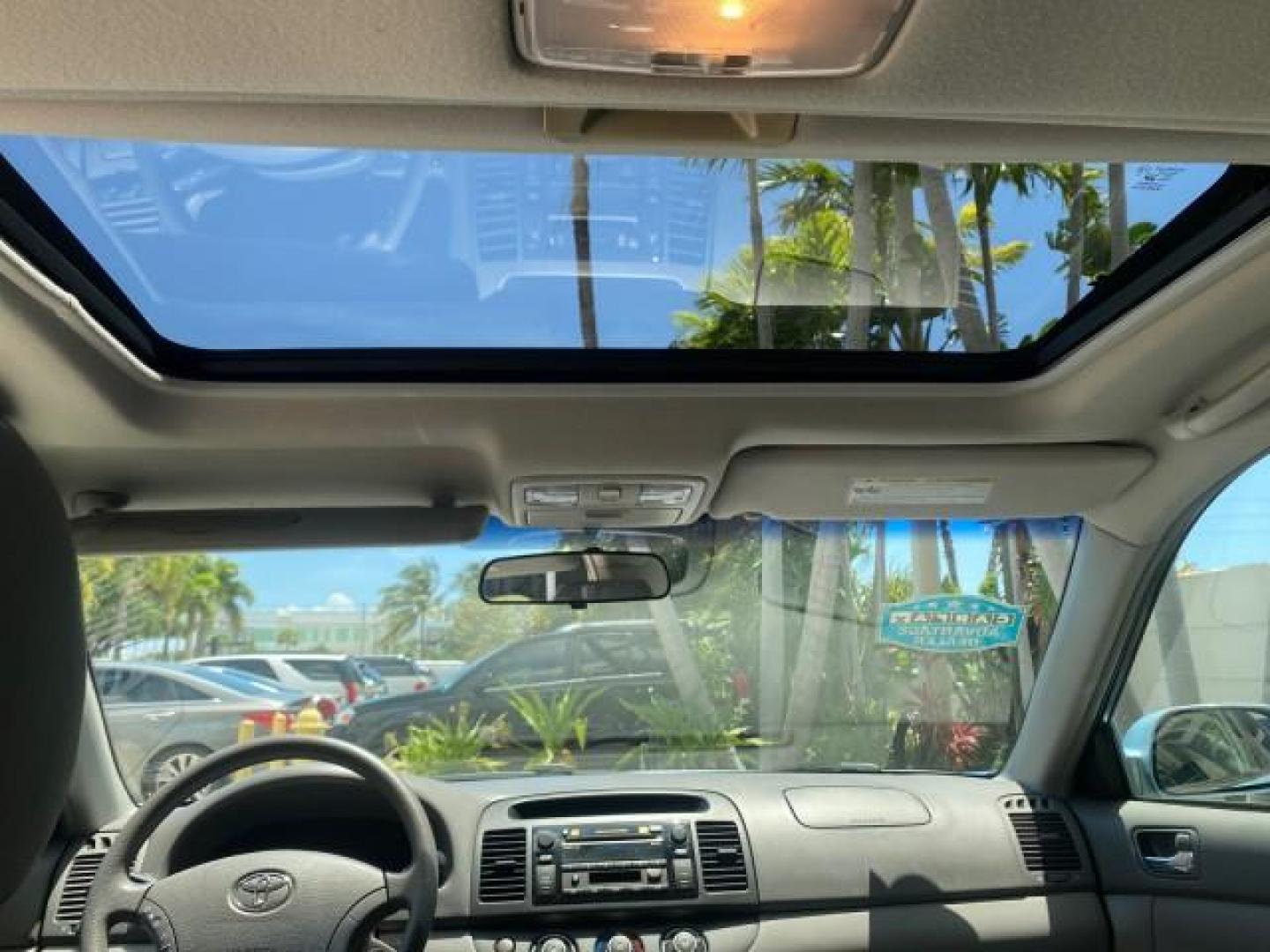 2005 Sky Blue Pearl /Stone Toyota Camry LE FL LOW MILES SUNROOF LEATHER (4T1BE32K25U) with an 2.4L DOHC SEFI Vvti 16-Valve 4-Cyl Engine engine, Automatic transmission, located at 4701 North Dixie Hwy, Pompano Beach, FL, 33064, (954) 422-2889, 26.240938, -80.123474 - OUR WEBPAGE FLORIDACARS1.COM HAS OVER 100 PHOTOS AND FREE CARFAX LINK 2005 TOYOTA CAMRY LE SUNROOF LEATHER VIN: 4T1BE32K25U531416 4 T 1 B E 3 2 K 2 5 U 5 3 1 4 1 6 SEDAN 4 DR 2.4L I4 F DOHC 16V 4 CYL 34 MPG GASOLINE FRONT WHEEL DRIVE Top Features JBL Sound System Leather Seats Basic Features ABS Bra - Photo#66