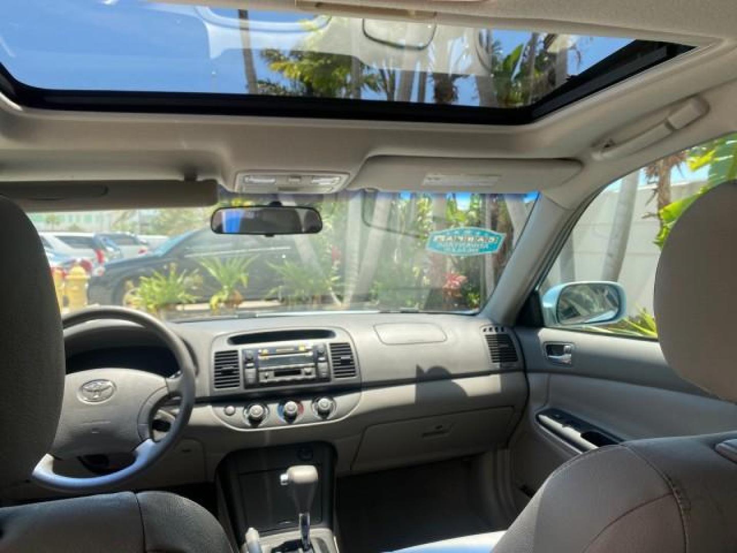 2005 Sky Blue Pearl /Stone Toyota Camry LE FL LOW MILES SUNROOF LEATHER (4T1BE32K25U) with an 2.4L DOHC SEFI Vvti 16-Valve 4-Cyl Engine engine, Automatic transmission, located at 4701 North Dixie Hwy, Pompano Beach, FL, 33064, (954) 422-2889, 26.240938, -80.123474 - OUR WEBPAGE FLORIDACARS1.COM HAS OVER 100 PHOTOS AND FREE CARFAX LINK 2005 TOYOTA CAMRY LE SUNROOF LEATHER VIN: 4T1BE32K25U531416 4 T 1 B E 3 2 K 2 5 U 5 3 1 4 1 6 SEDAN 4 DR 2.4L I4 F DOHC 16V 4 CYL 34 MPG GASOLINE FRONT WHEEL DRIVE Top Features JBL Sound System Leather Seats Basic Features ABS Bra - Photo#68