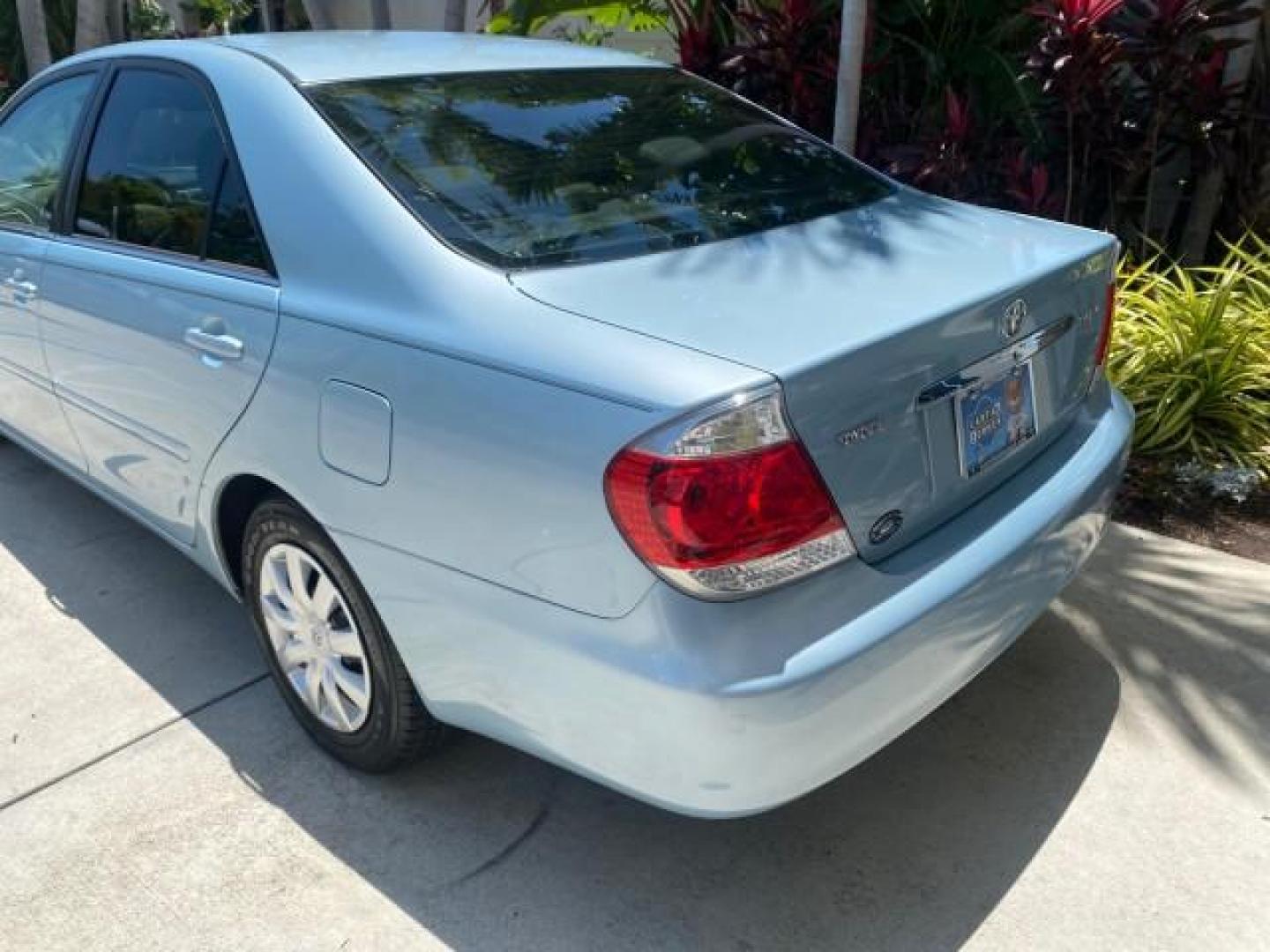 2005 Sky Blue Pearl /Stone Toyota Camry LE FL LOW MILES SUNROOF LEATHER (4T1BE32K25U) with an 2.4L DOHC SEFI Vvti 16-Valve 4-Cyl Engine engine, Automatic transmission, located at 4701 North Dixie Hwy, Pompano Beach, FL, 33064, (954) 422-2889, 26.240938, -80.123474 - OUR WEBPAGE FLORIDACARS1.COM HAS OVER 100 PHOTOS AND FREE CARFAX LINK 2005 TOYOTA CAMRY LE SUNROOF LEATHER VIN: 4T1BE32K25U531416 4 T 1 B E 3 2 K 2 5 U 5 3 1 4 1 6 SEDAN 4 DR 2.4L I4 F DOHC 16V 4 CYL 34 MPG GASOLINE FRONT WHEEL DRIVE Top Features JBL Sound System Leather Seats Basic Features ABS Bra - Photo#73