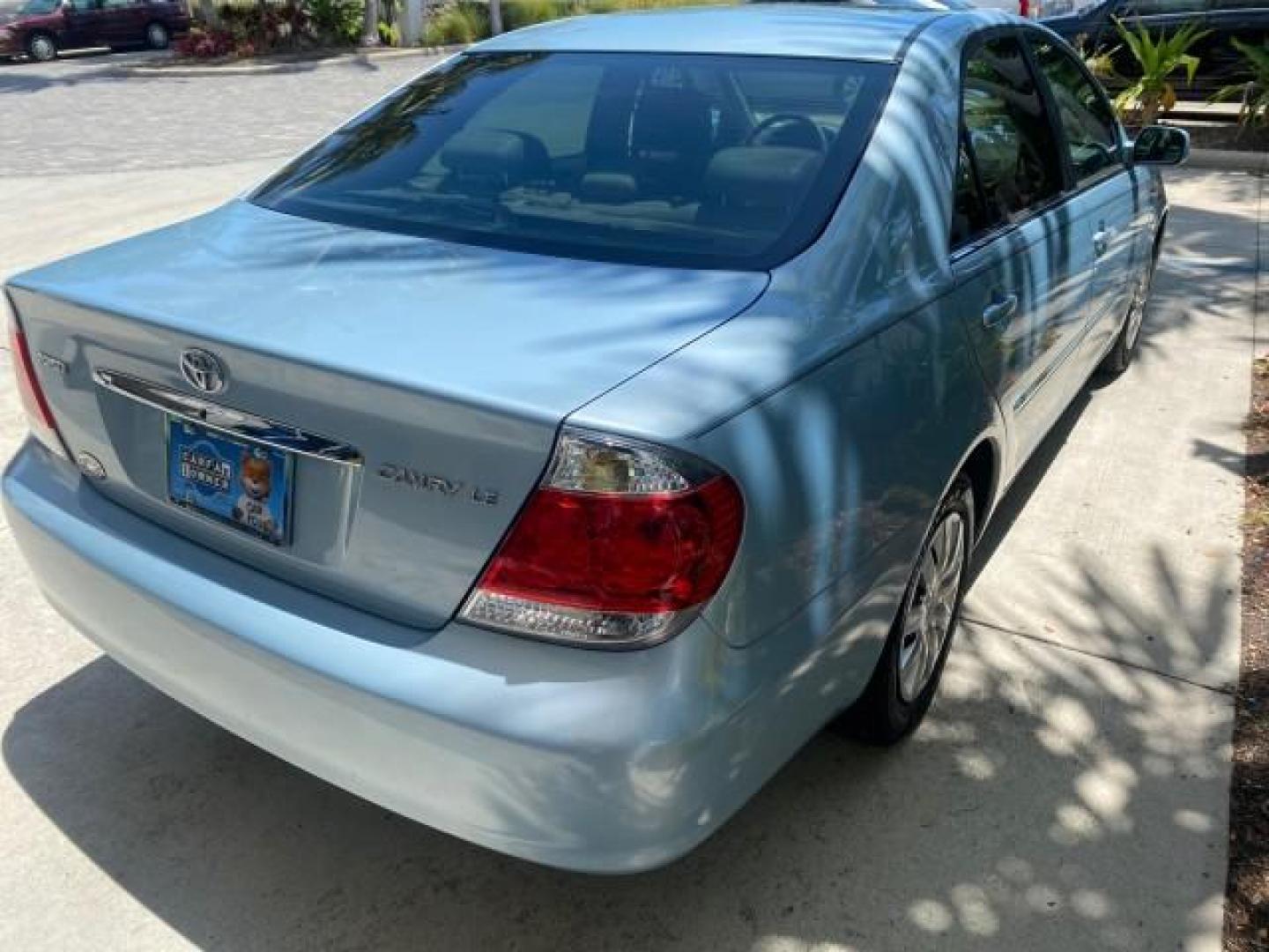 2005 Sky Blue Pearl /Stone Toyota Camry LE FL LOW MILES SUNROOF LEATHER (4T1BE32K25U) with an 2.4L DOHC SEFI Vvti 16-Valve 4-Cyl Engine engine, Automatic transmission, located at 4701 North Dixie Hwy, Pompano Beach, FL, 33064, (954) 422-2889, 26.240938, -80.123474 - OUR WEBPAGE FLORIDACARS1.COM HAS OVER 100 PHOTOS AND FREE CARFAX LINK 2005 TOYOTA CAMRY LE SUNROOF LEATHER VIN: 4T1BE32K25U531416 4 T 1 B E 3 2 K 2 5 U 5 3 1 4 1 6 SEDAN 4 DR 2.4L I4 F DOHC 16V 4 CYL 34 MPG GASOLINE FRONT WHEEL DRIVE Top Features JBL Sound System Leather Seats Basic Features ABS Bra - Photo#75