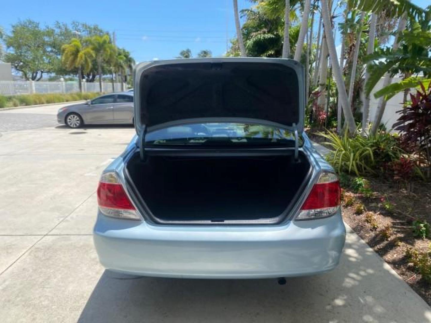2005 Sky Blue Pearl /Stone Toyota Camry LE FL LOW MILES SUNROOF LEATHER (4T1BE32K25U) with an 2.4L DOHC SEFI Vvti 16-Valve 4-Cyl Engine engine, Automatic transmission, located at 4701 North Dixie Hwy, Pompano Beach, FL, 33064, (954) 422-2889, 26.240938, -80.123474 - OUR WEBPAGE FLORIDACARS1.COM HAS OVER 100 PHOTOS AND FREE CARFAX LINK 2005 TOYOTA CAMRY LE SUNROOF LEATHER VIN: 4T1BE32K25U531416 4 T 1 B E 3 2 K 2 5 U 5 3 1 4 1 6 SEDAN 4 DR 2.4L I4 F DOHC 16V 4 CYL 34 MPG GASOLINE FRONT WHEEL DRIVE Top Features JBL Sound System Leather Seats Basic Features ABS Bra - Photo#76