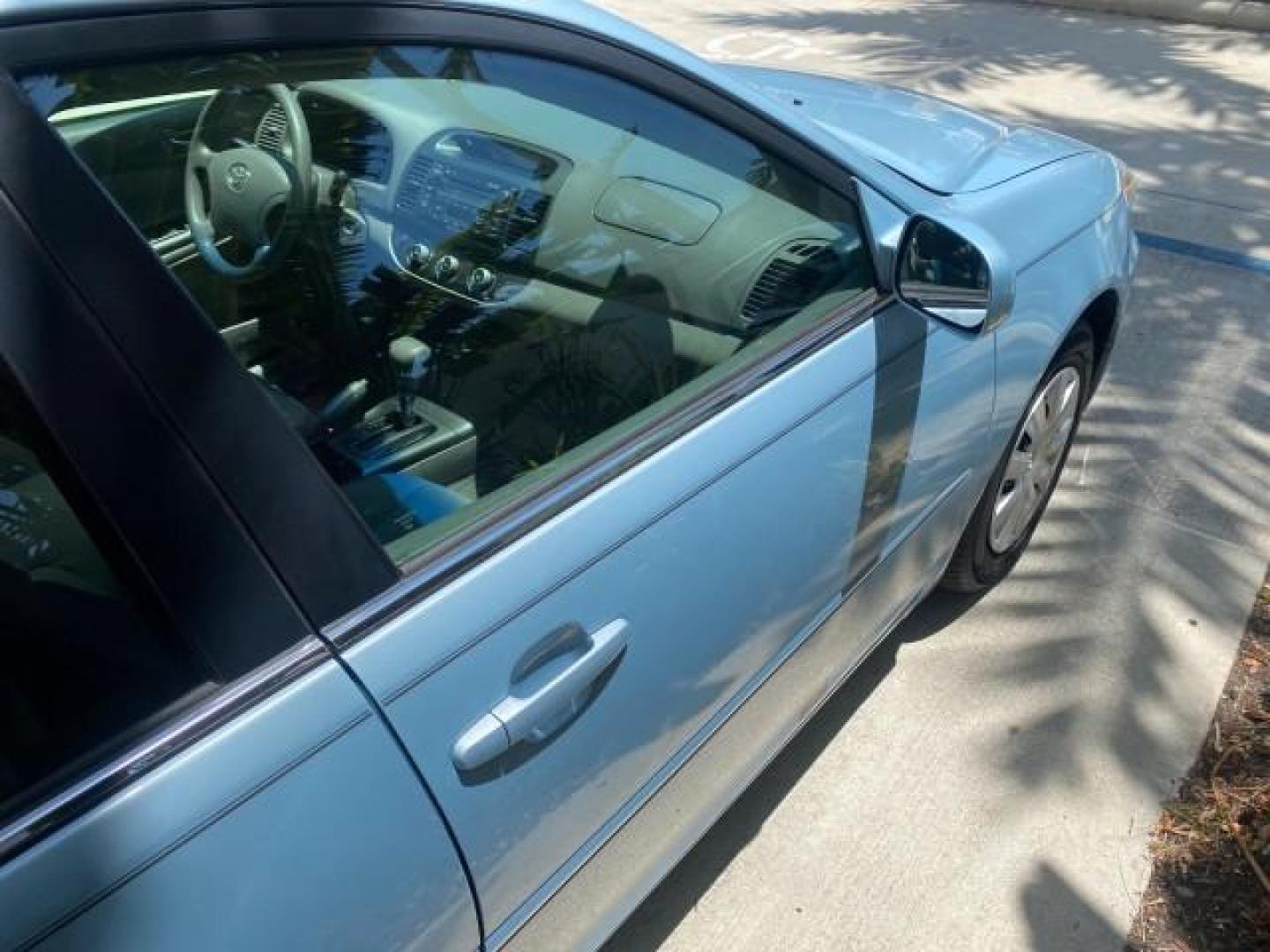 2005 Sky Blue Pearl /Stone Toyota Camry LE FL LOW MILES SUNROOF LEATHER (4T1BE32K25U) with an 2.4L DOHC SEFI Vvti 16-Valve 4-Cyl Engine engine, Automatic transmission, located at 4701 North Dixie Hwy, Pompano Beach, FL, 33064, (954) 422-2889, 26.240938, -80.123474 - OUR WEBPAGE FLORIDACARS1.COM HAS OVER 100 PHOTOS AND FREE CARFAX LINK 2005 TOYOTA CAMRY LE SUNROOF LEATHER VIN: 4T1BE32K25U531416 4 T 1 B E 3 2 K 2 5 U 5 3 1 4 1 6 SEDAN 4 DR 2.4L I4 F DOHC 16V 4 CYL 34 MPG GASOLINE FRONT WHEEL DRIVE Top Features JBL Sound System Leather Seats Basic Features ABS Bra - Photo#89