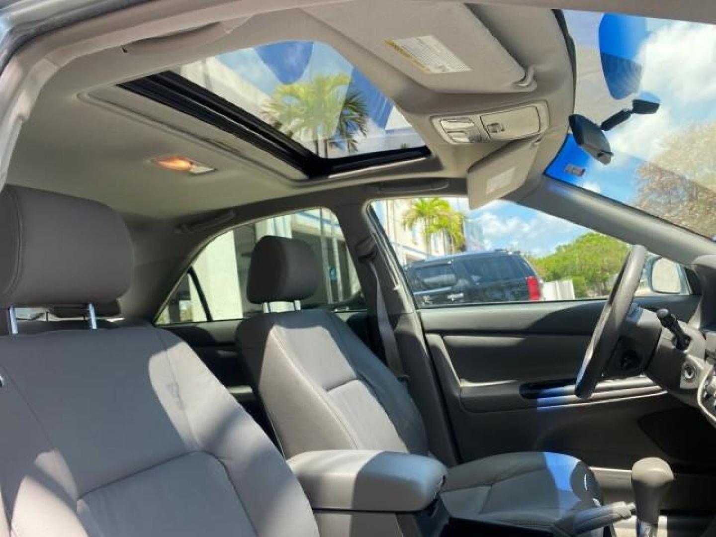 2005 Sky Blue Pearl /Stone Toyota Camry LE FL LOW MILES SUNROOF LEATHER (4T1BE32K25U) with an 2.4L DOHC SEFI Vvti 16-Valve 4-Cyl Engine engine, Automatic transmission, located at 4701 North Dixie Hwy, Pompano Beach, FL, 33064, (954) 422-2889, 26.240938, -80.123474 - OUR WEBPAGE FLORIDACARS1.COM HAS OVER 100 PHOTOS AND FREE CARFAX LINK 2005 TOYOTA CAMRY LE SUNROOF LEATHER VIN: 4T1BE32K25U531416 4 T 1 B E 3 2 K 2 5 U 5 3 1 4 1 6 SEDAN 4 DR 2.4L I4 F DOHC 16V 4 CYL 34 MPG GASOLINE FRONT WHEEL DRIVE Top Features JBL Sound System Leather Seats Basic Features ABS Bra - Photo#92