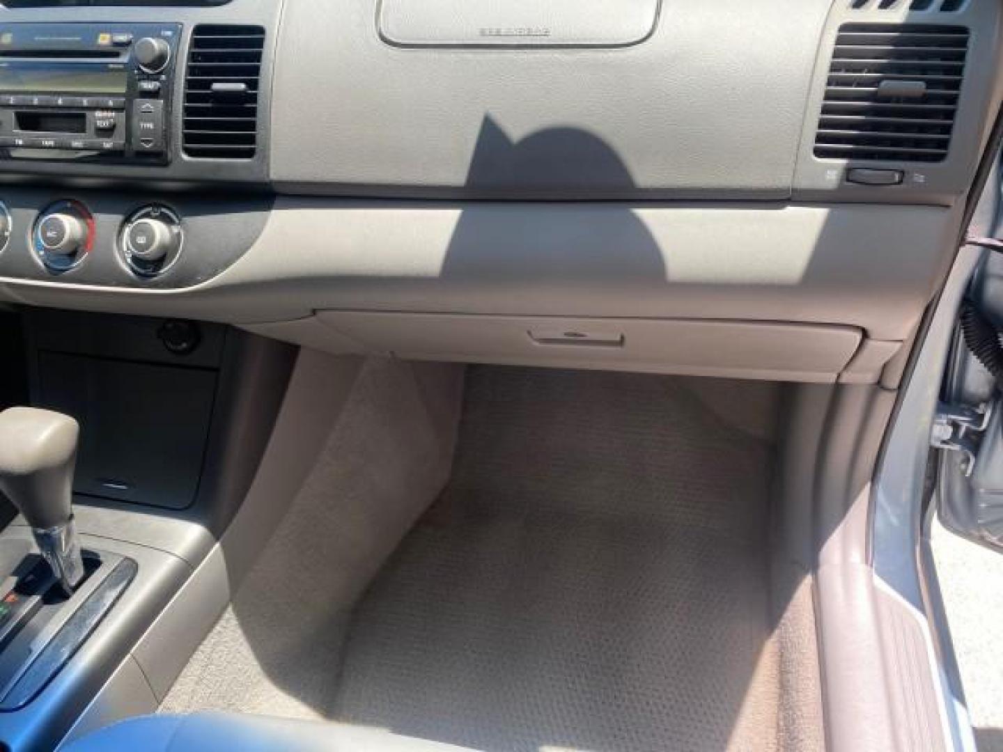 2005 Sky Blue Pearl /Stone Toyota Camry LE FL LOW MILES SUNROOF LEATHER (4T1BE32K25U) with an 2.4L DOHC SEFI Vvti 16-Valve 4-Cyl Engine engine, Automatic transmission, located at 4701 North Dixie Hwy, Pompano Beach, FL, 33064, (954) 422-2889, 26.240938, -80.123474 - OUR WEBPAGE FLORIDACARS1.COM HAS OVER 100 PHOTOS AND FREE CARFAX LINK 2005 TOYOTA CAMRY LE SUNROOF LEATHER VIN: 4T1BE32K25U531416 4 T 1 B E 3 2 K 2 5 U 5 3 1 4 1 6 SEDAN 4 DR 2.4L I4 F DOHC 16V 4 CYL 34 MPG GASOLINE FRONT WHEEL DRIVE Top Features JBL Sound System Leather Seats Basic Features ABS Bra - Photo#96