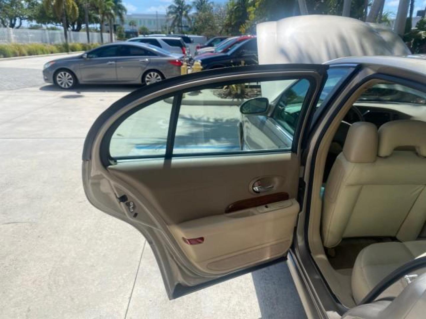2004 Light Bronzemist Metallic /Cashmere Buick LeSabre Custom LOW MILES 33,563 (1G4HP54K744) with an 3.8L 3800 V6 SFI Engine engine, Automatic transmission, located at 4701 North Dixie Hwy, Pompano Beach, FL, 33064, (954) 422-2889, 26.240938, -80.123474 - OUR WEBPAGE FLORIDACARS1.COM HAS OVER 100 PHOTOS AND FREE CARFAX LINK 2004 BUICK LESABRE CUSTOM VIN: 1G4HP54K744143982 1 G 4 H P 5 4 K 7 4 4 1 4 3 9 8 2 SEDAN 4 DR 3.8L V6 F OHV 29 MPG GASOLINE FRONT WHEEL DRIVE Top Features Cloth Seats Basic Features ABS Brakes Automatic Transmission Power Locks Po - Photo#13
