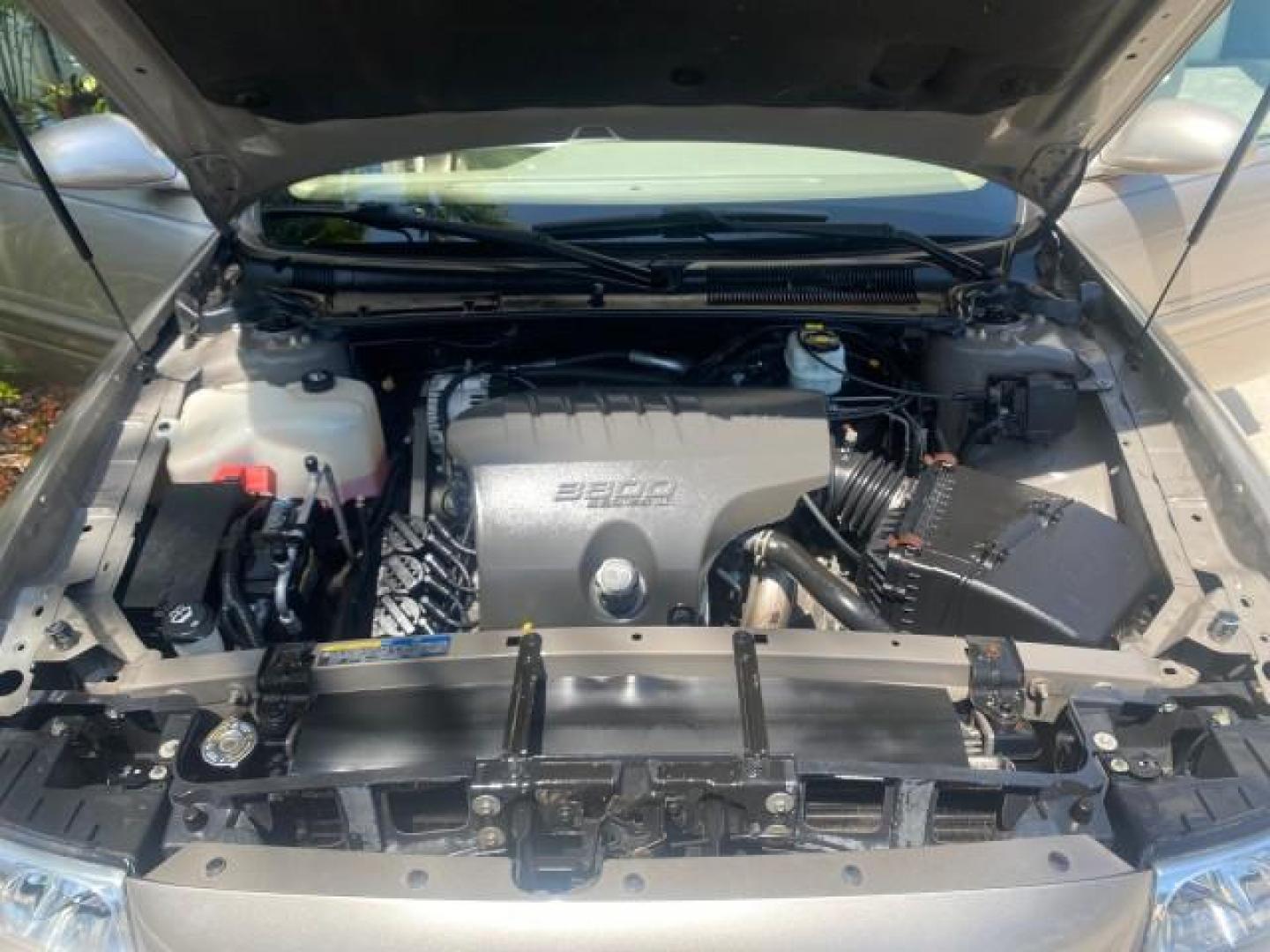 2004 Light Bronzemist Metallic /Cashmere Buick LeSabre Custom LOW MILES 33,563 (1G4HP54K744) with an 3.8L 3800 V6 SFI Engine engine, Automatic transmission, located at 4701 North Dixie Hwy, Pompano Beach, FL, 33064, (954) 422-2889, 26.240938, -80.123474 - OUR WEBPAGE FLORIDACARS1.COM HAS OVER 100 PHOTOS AND FREE CARFAX LINK 2004 BUICK LESABRE CUSTOM VIN: 1G4HP54K744143982 1 G 4 H P 5 4 K 7 4 4 1 4 3 9 8 2 SEDAN 4 DR 3.8L V6 F OHV 29 MPG GASOLINE FRONT WHEEL DRIVE Top Features Cloth Seats Basic Features ABS Brakes Automatic Transmission Power Locks Po - Photo#17