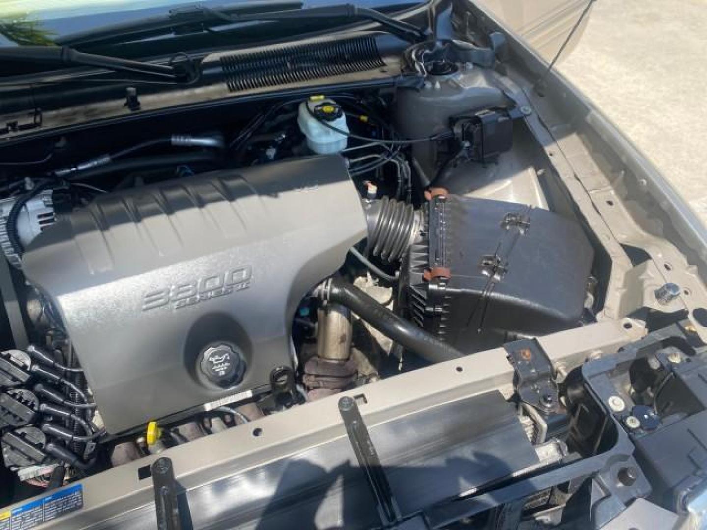 2004 Light Bronzemist Metallic /Cashmere Buick LeSabre Custom LOW MILES 33,563 (1G4HP54K744) with an 3.8L 3800 V6 SFI Engine engine, Automatic transmission, located at 4701 North Dixie Hwy, Pompano Beach, FL, 33064, (954) 422-2889, 26.240938, -80.123474 - OUR WEBPAGE FLORIDACARS1.COM HAS OVER 100 PHOTOS AND FREE CARFAX LINK 2004 BUICK LESABRE CUSTOM VIN: 1G4HP54K744143982 1 G 4 H P 5 4 K 7 4 4 1 4 3 9 8 2 SEDAN 4 DR 3.8L V6 F OHV 29 MPG GASOLINE FRONT WHEEL DRIVE Top Features Cloth Seats Basic Features ABS Brakes Automatic Transmission Power Locks Po - Photo#26