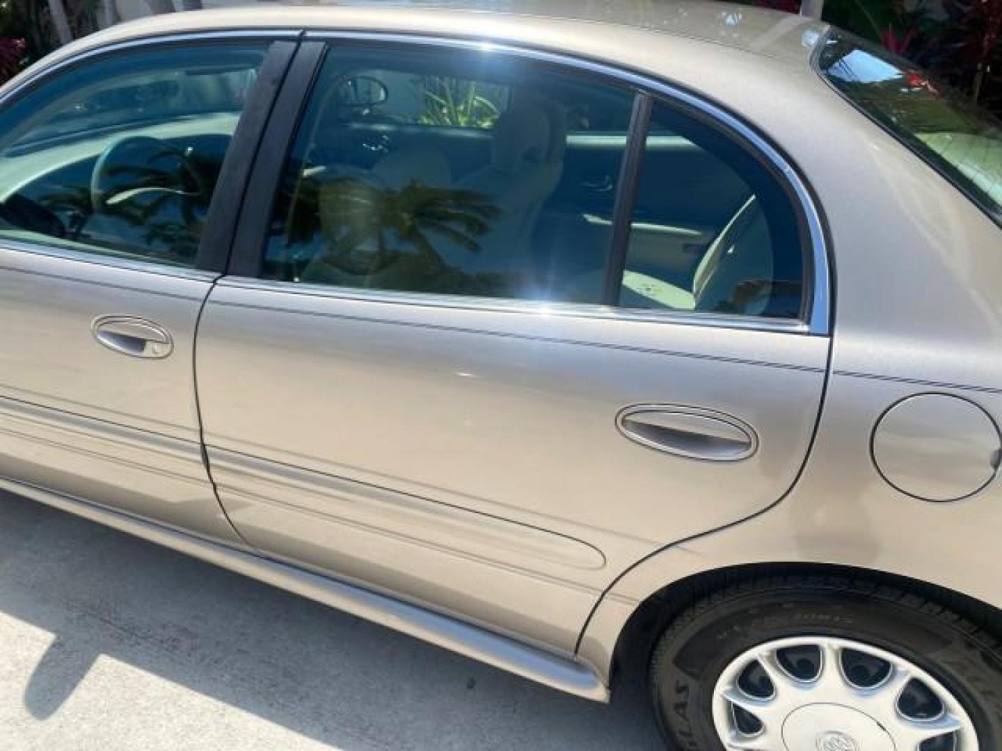 2004 Light Bronzemist Metallic /Cashmere Buick LeSabre Custom LOW MILES 33,563 (1G4HP54K744) with an 3.8L 3800 V6 SFI Engine engine, Automatic transmission, located at 4701 North Dixie Hwy, Pompano Beach, FL, 33064, (954) 422-2889, 26.240938, -80.123474 - OUR WEBPAGE FLORIDACARS1.COM HAS OVER 100 PHOTOS AND FREE CARFAX LINK 2004 BUICK LESABRE CUSTOM VIN: 1G4HP54K744143982 1 G 4 H P 5 4 K 7 4 4 1 4 3 9 8 2 SEDAN 4 DR 3.8L V6 F OHV 29 MPG GASOLINE FRONT WHEEL DRIVE Top Features Cloth Seats Basic Features ABS Brakes Automatic Transmission Power Locks Po - Photo#56
