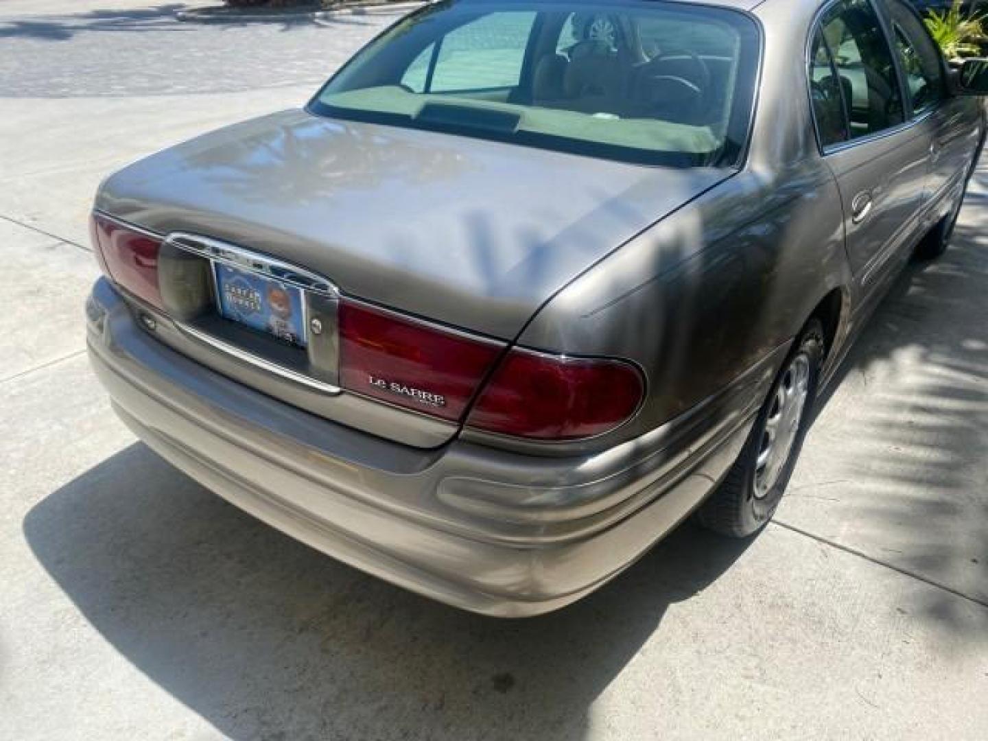 2004 Light Bronzemist Metallic /Cashmere Buick LeSabre Custom LOW MILES 33,563 (1G4HP54K744) with an 3.8L 3800 V6 SFI Engine engine, Automatic transmission, located at 4701 North Dixie Hwy, Pompano Beach, FL, 33064, (954) 422-2889, 26.240938, -80.123474 - OUR WEBPAGE FLORIDACARS1.COM HAS OVER 100 PHOTOS AND FREE CARFAX LINK 2004 BUICK LESABRE CUSTOM VIN: 1G4HP54K744143982 1 G 4 H P 5 4 K 7 4 4 1 4 3 9 8 2 SEDAN 4 DR 3.8L V6 F OHV 29 MPG GASOLINE FRONT WHEEL DRIVE Top Features Cloth Seats Basic Features ABS Brakes Automatic Transmission Power Locks Po - Photo#70