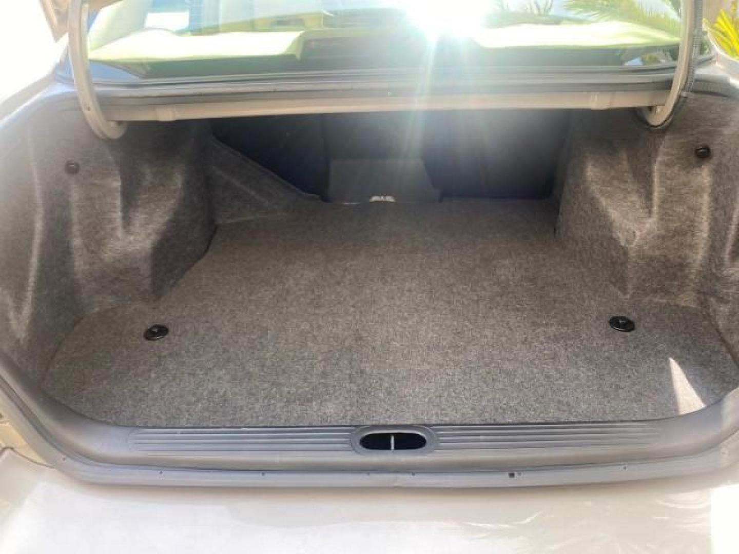 2004 Light Bronzemist Metallic /Cashmere Buick LeSabre Custom LOW MILES 33,563 (1G4HP54K744) with an 3.8L 3800 V6 SFI Engine engine, Automatic transmission, located at 4701 North Dixie Hwy, Pompano Beach, FL, 33064, (954) 422-2889, 26.240938, -80.123474 - OUR WEBPAGE FLORIDACARS1.COM HAS OVER 100 PHOTOS AND FREE CARFAX LINK 2004 BUICK LESABRE CUSTOM VIN: 1G4HP54K744143982 1 G 4 H P 5 4 K 7 4 4 1 4 3 9 8 2 SEDAN 4 DR 3.8L V6 F OHV 29 MPG GASOLINE FRONT WHEEL DRIVE Top Features Cloth Seats Basic Features ABS Brakes Automatic Transmission Power Locks Po - Photo#72
